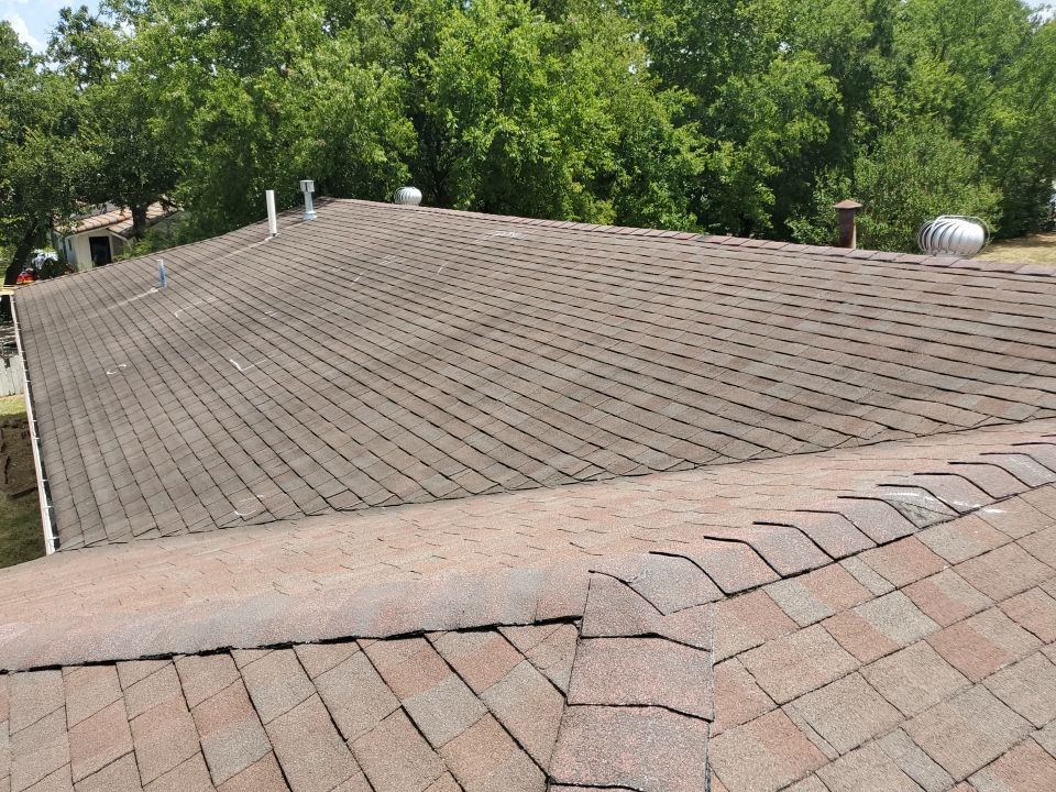 Residential Roofing Installation using Roofing Shingles by Harvey Roofing & Construction