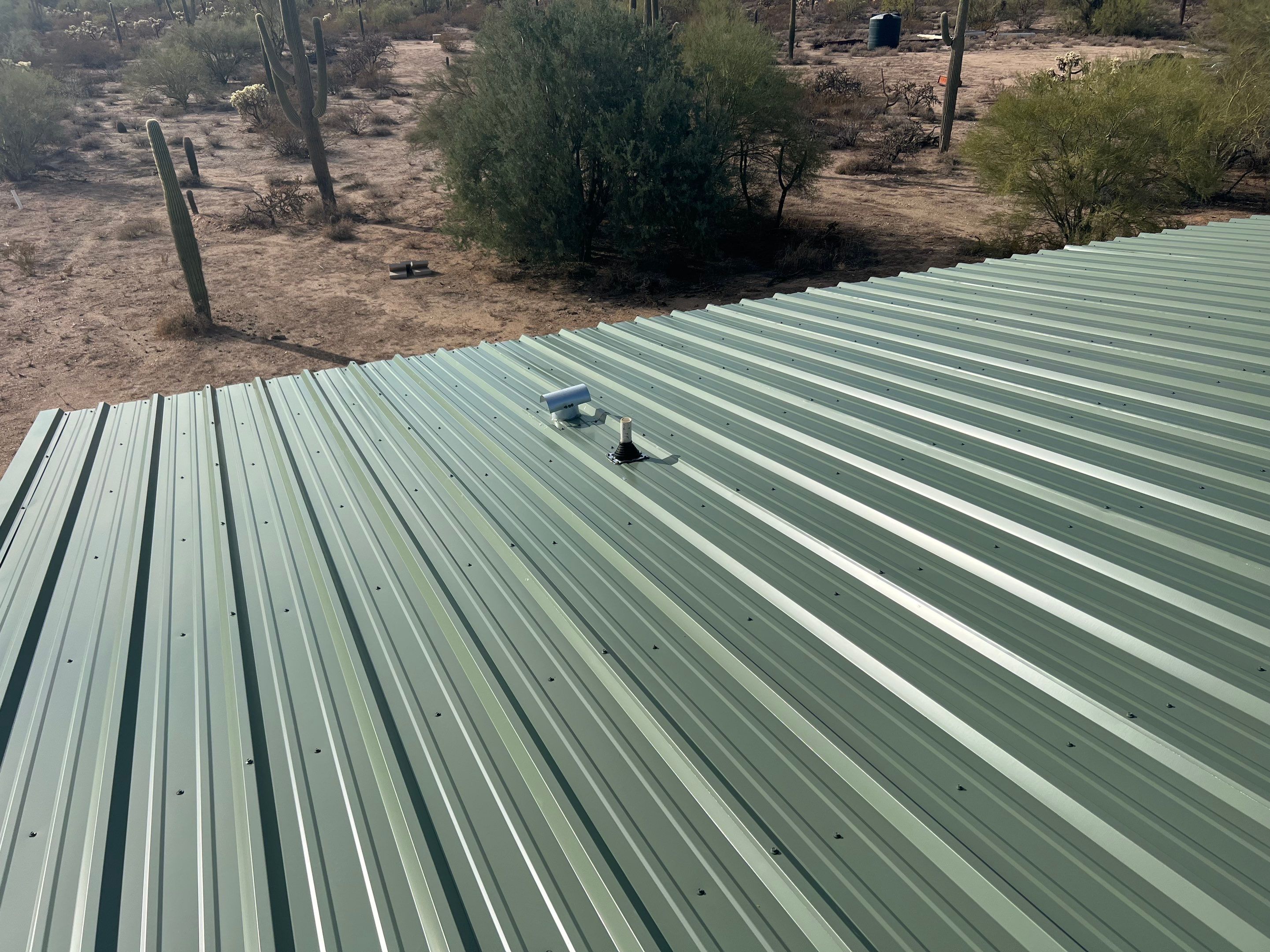 Sage Green Exposed Fastener by Reimagine Roofing