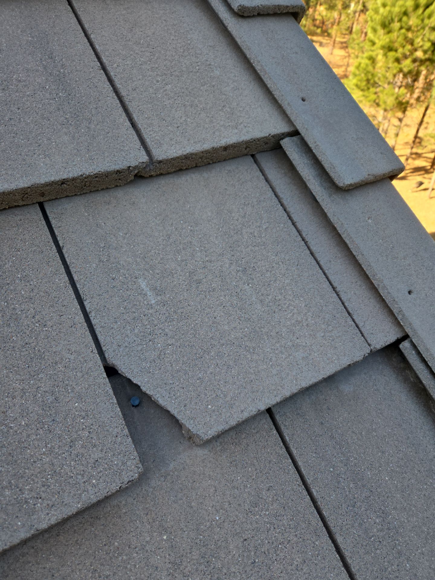 Broken Tile Replacement by RTP Roofing Company