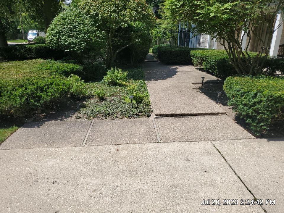 Aggregate concrete cleaning and sealing using Surebond SB-9000 by Northern Power Washing LLC.