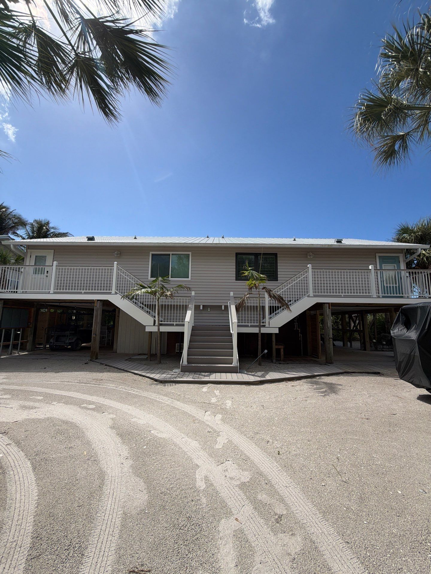 Elevated Deck and Composite Staircase Replacement in Placida Florida by Smirnov Construction Inc