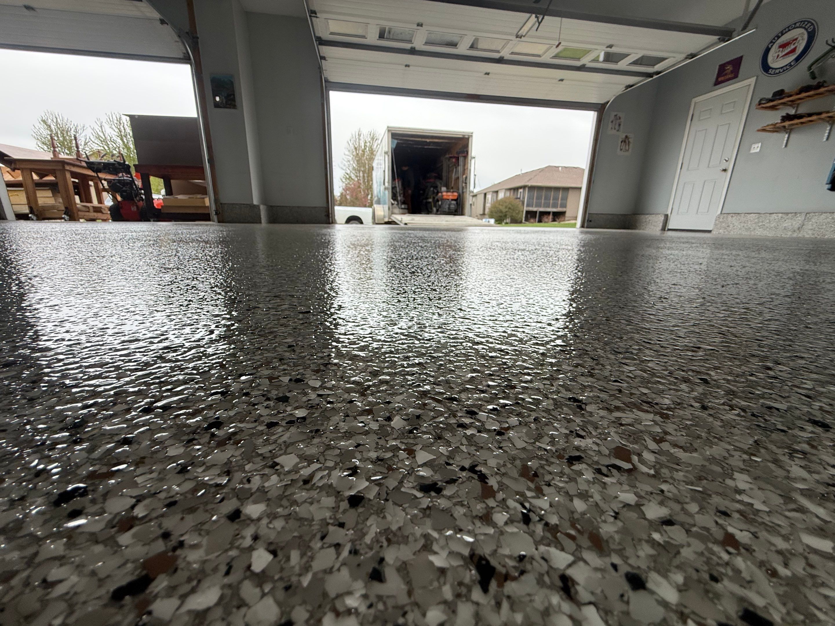 High-Gloss Epoxy Garage Floor Coating in Sioux Falls by Select Painting, Coatings & Garage Cabinets