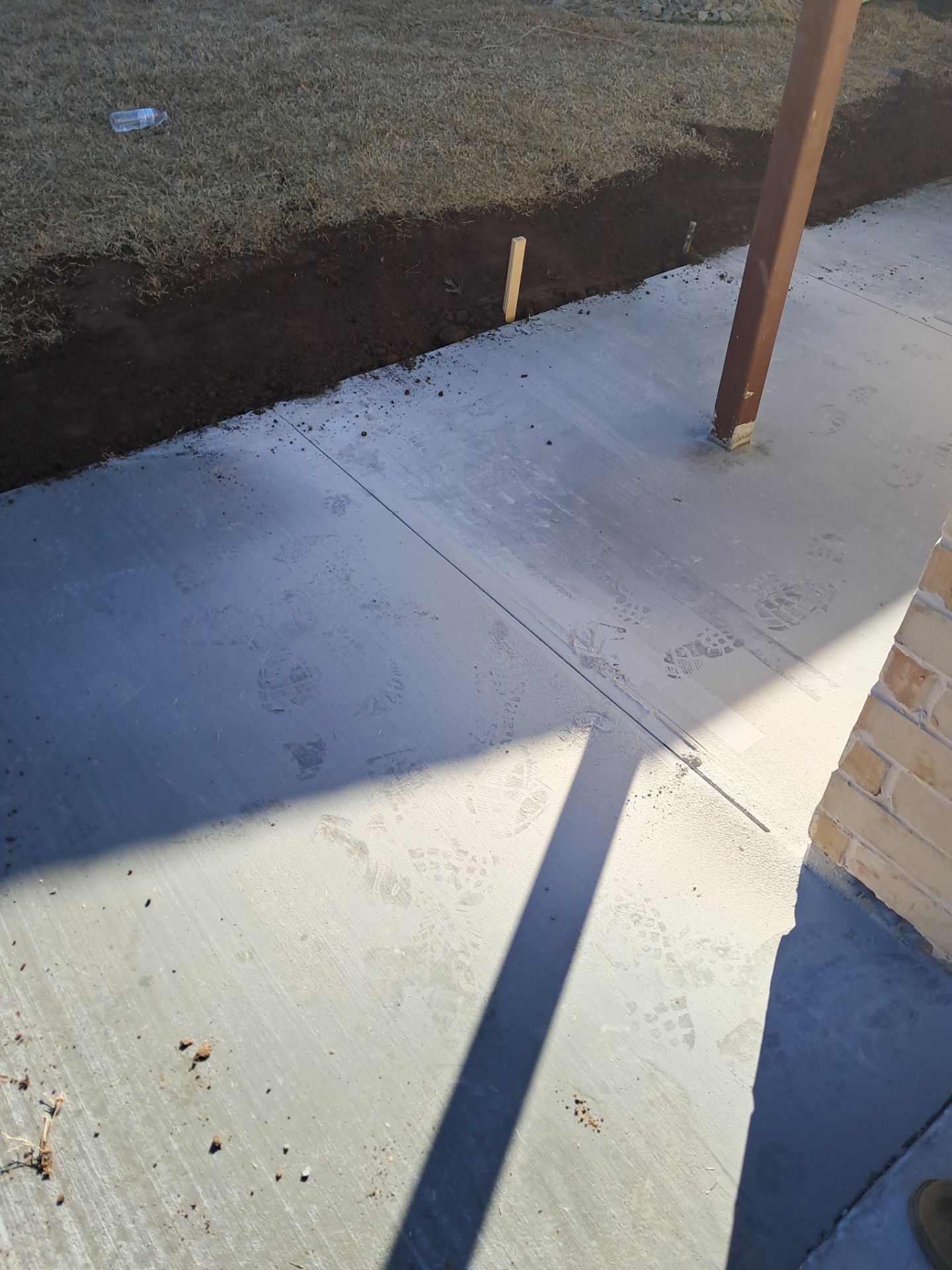 Concrete Sidewalk And Footer by Clays Services Inc