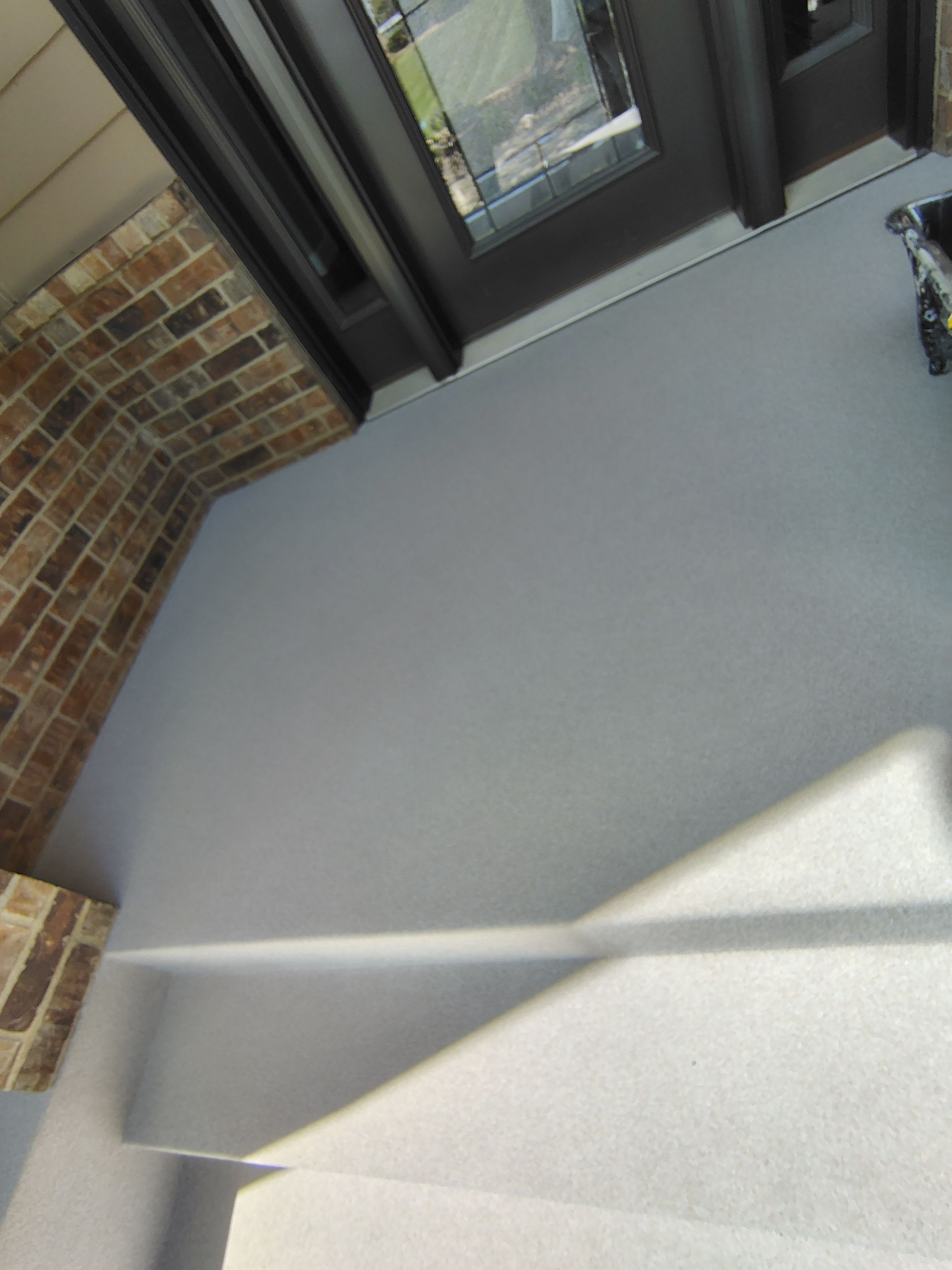 Front Porch Concrete Coating and Restoration in Harrisburg by Select Painting, Coatings & Garage Cabinets