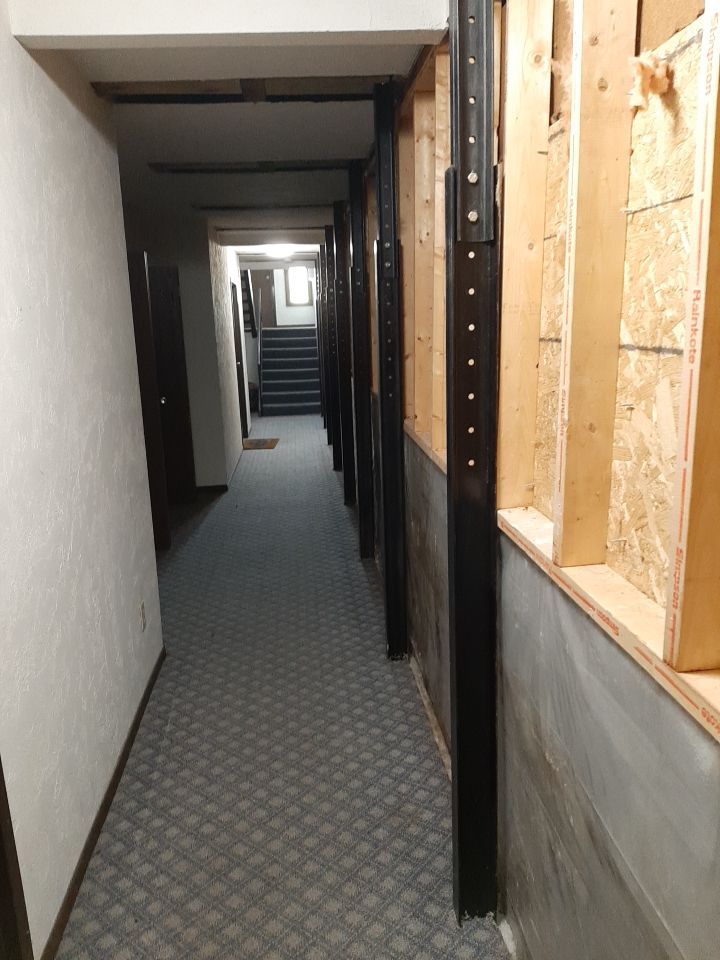 Exterior Deep Waterproofing System with Wall Push Back and Steel Beams Reinforcement by Toledo Basement Repair