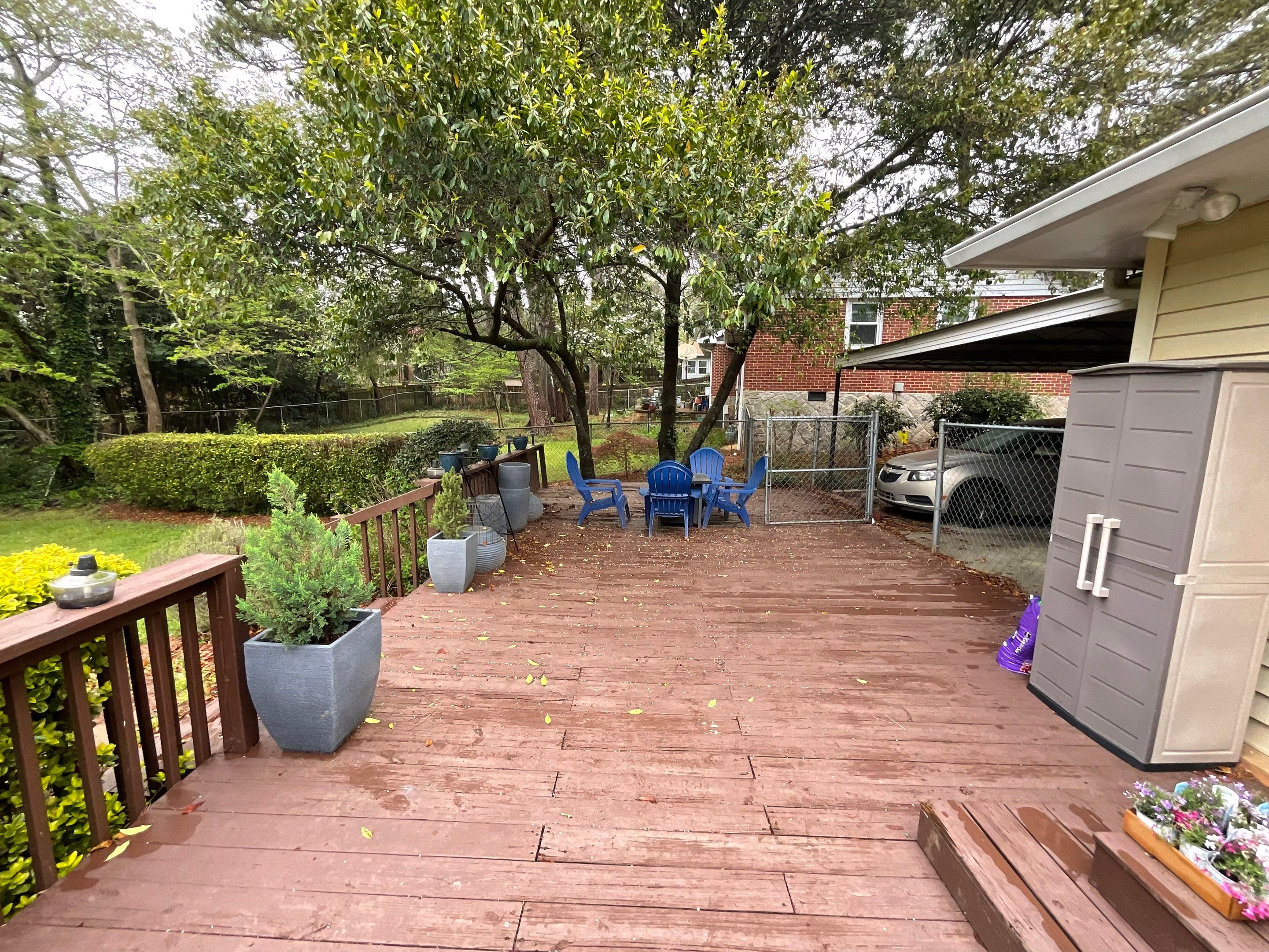 Custom Pressure-Treated Wood Deck and Railing Installation in Decatur by Swift Home Renovations