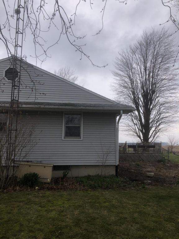 Storm damage roof replacement by Nitro Roofing and Construction