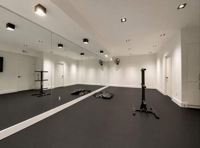 Basement Finishing Project with Home Gym and Sauna in Prospect by Authentic Carpentry
