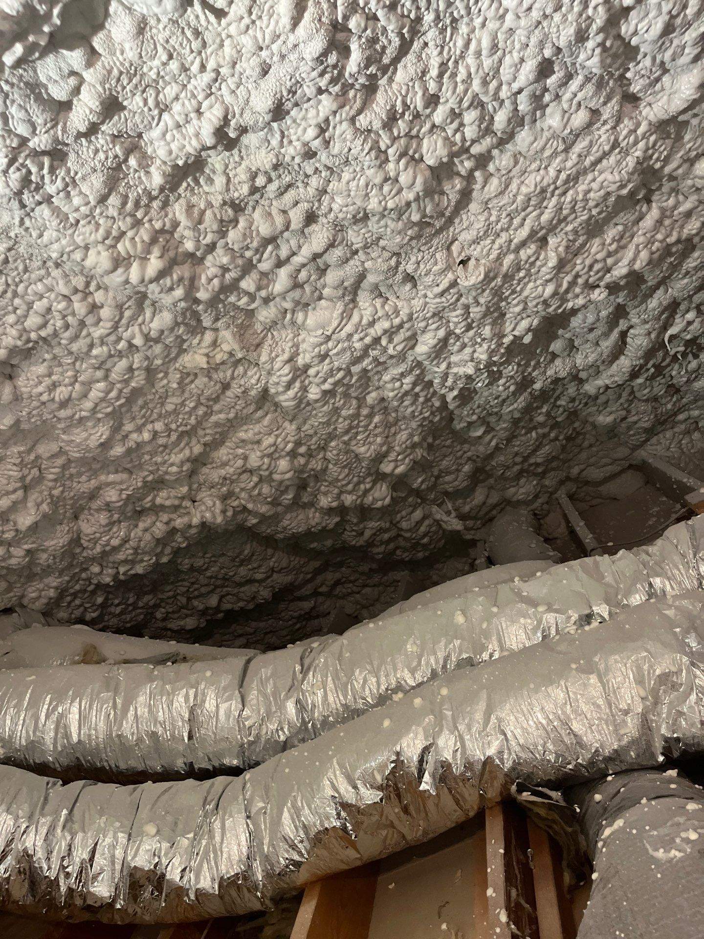 Attic Insulation using open cell spray foam by NYS Foam & Energy