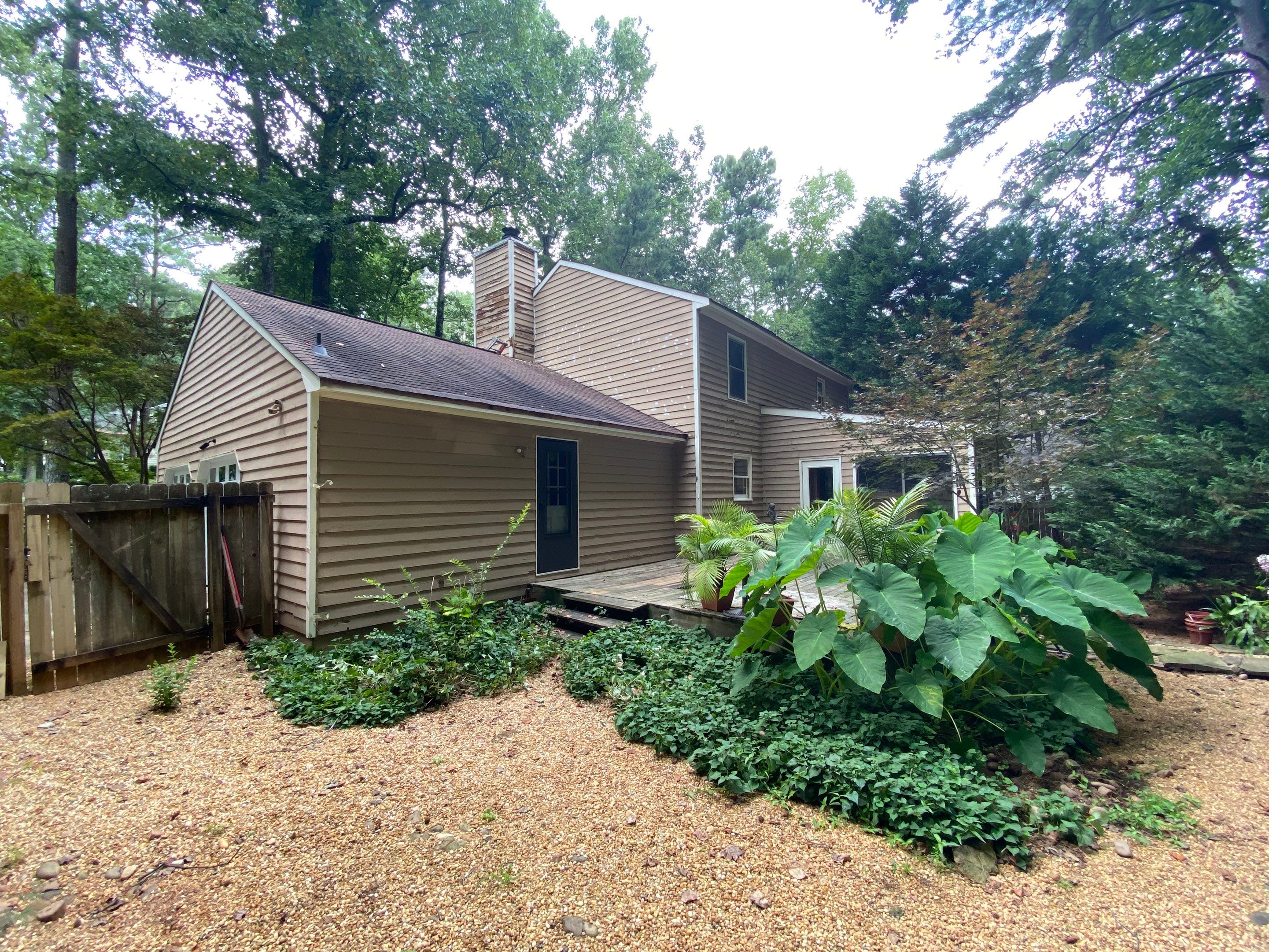 Mableton Exterior Painting and Pressure Treated Wood Deck Installation by Swift Home Renovations
