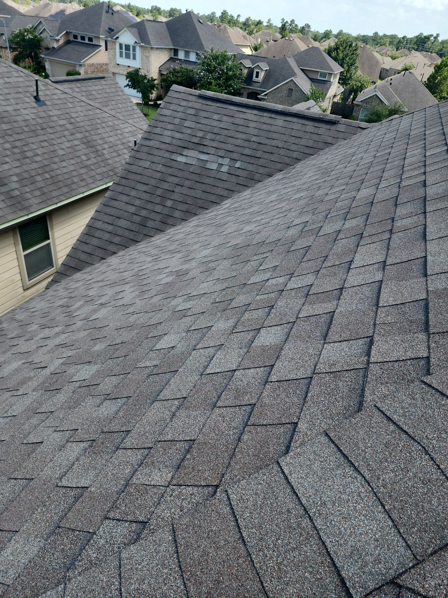 Hail Damage using Owen's Corning Duration (Lifetime) Shingles by Roof Repair Company