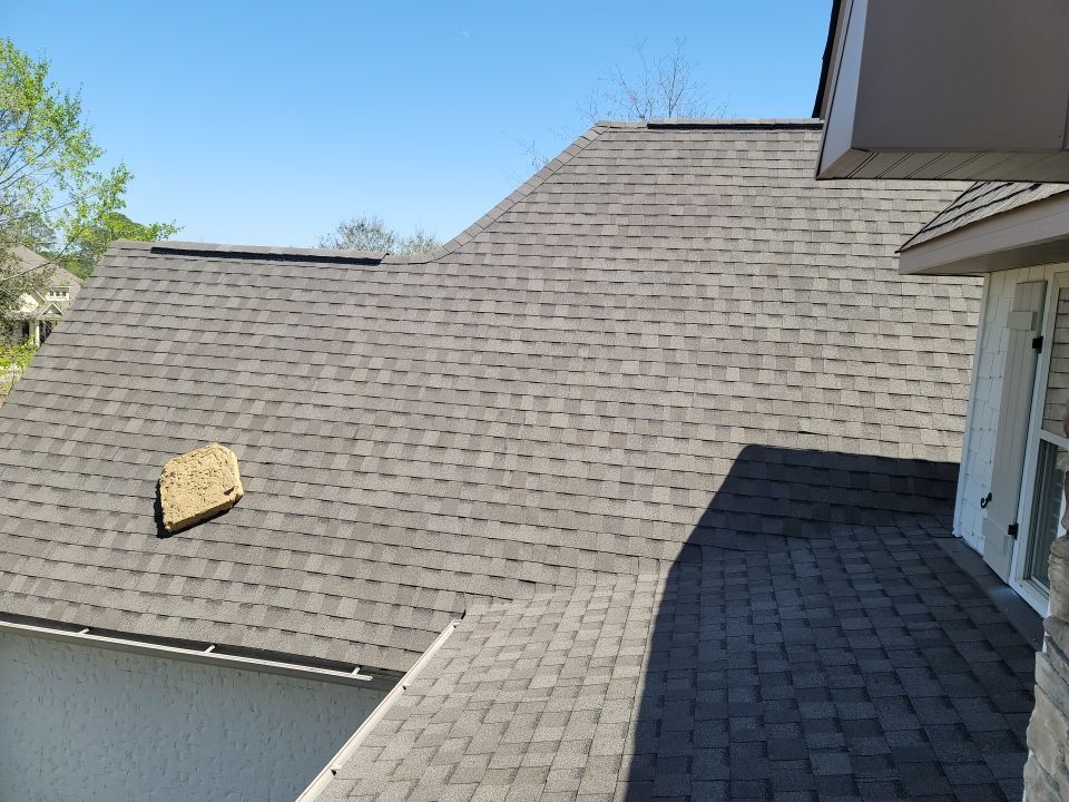 Residential Roofing Installation using Roof Replacement by American Roofing & Construction LLC