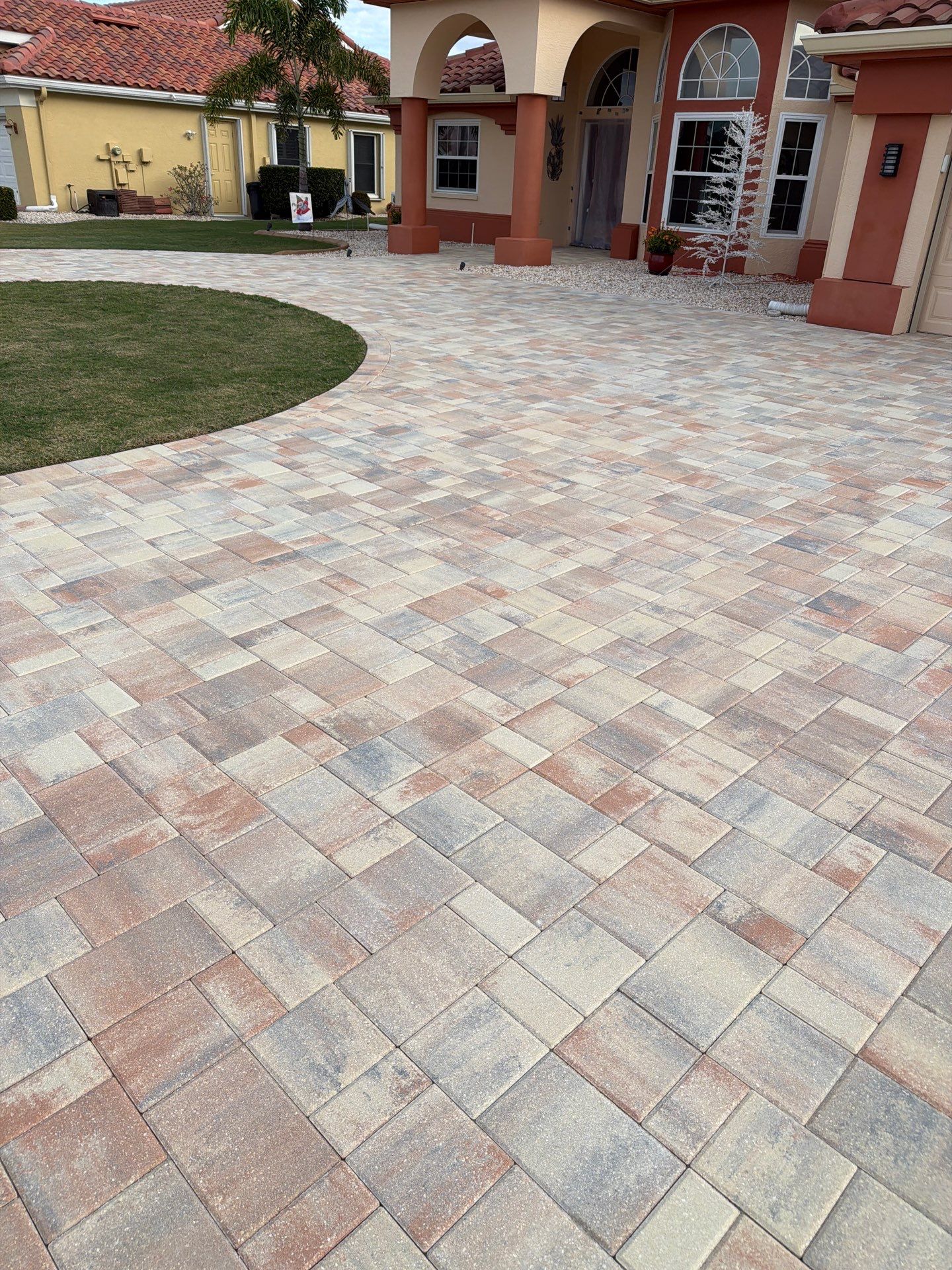 Professional Paver Sealing for this beautiful Driveway in Sun City Center by Supreme Paver Experts