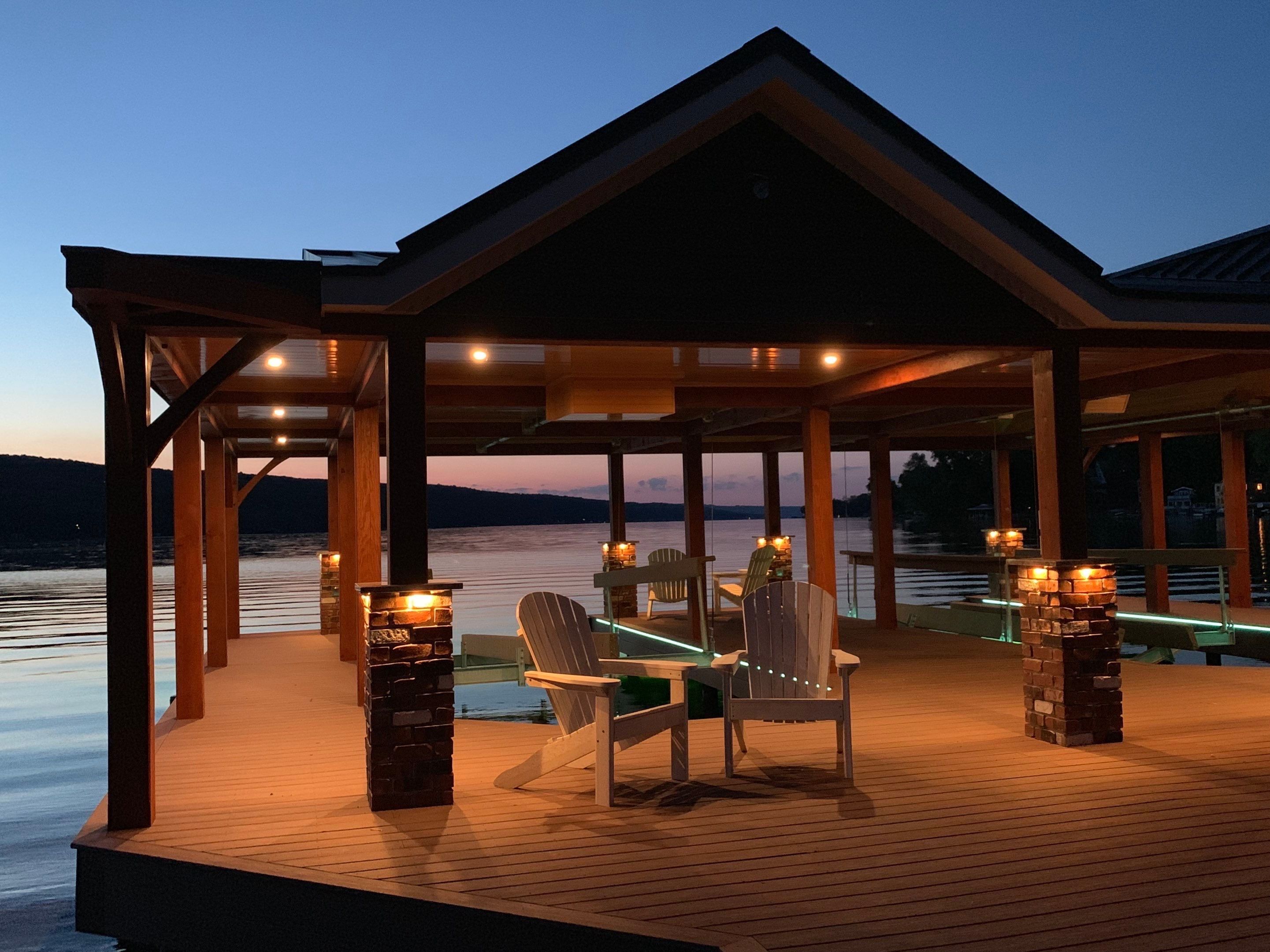Custom Timber-Framed Boat Dock with Multi-Color LED Lighting on Keuka Lake, New York by Outdoor Lights + Shades