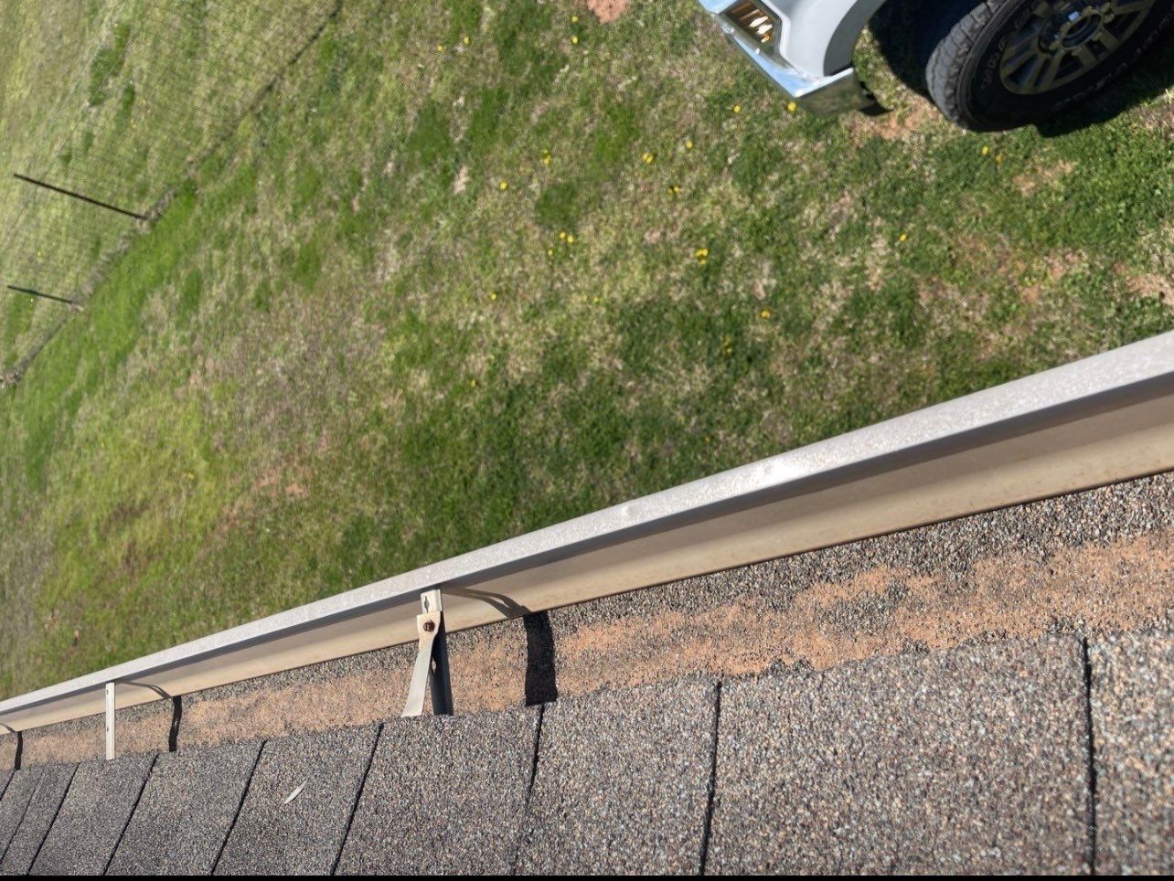 Hail Damage on a Roofing System by Icon Roofing And Construction 