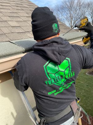 Turtle Shell gutter protection installation in Naperville, IL 60565, photograph 31