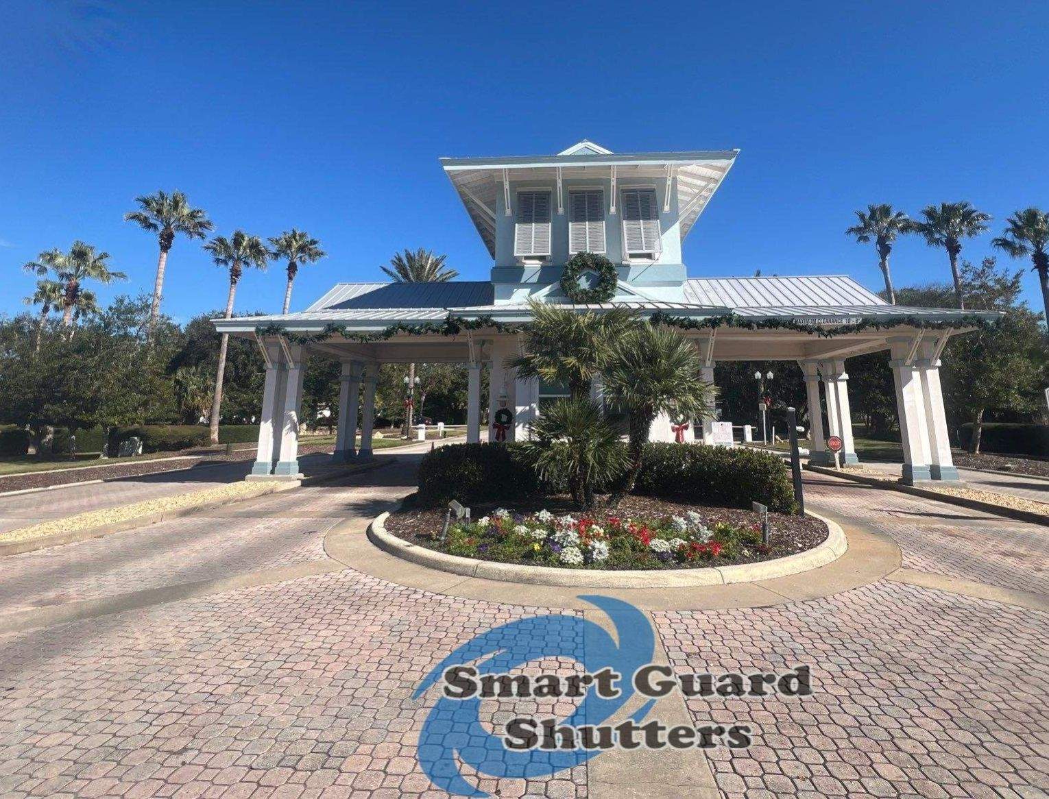 Decorative Bahama Shutters in Window Grey by Smart Guard Shutters