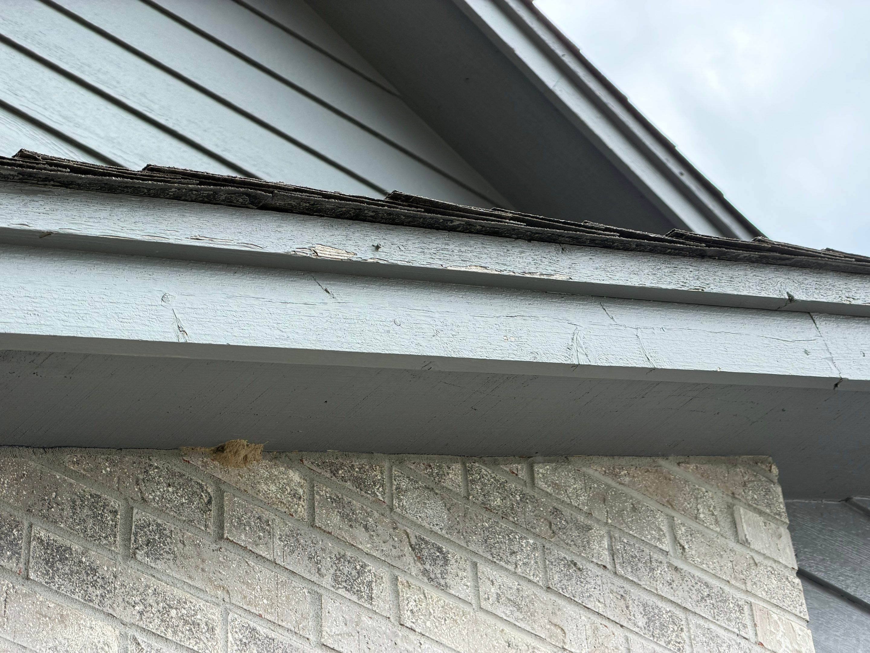 Full Exterior Painting for Gray Siding and Trim in Sioux Falls by Select Painting, Coatings & Garage Cabinets