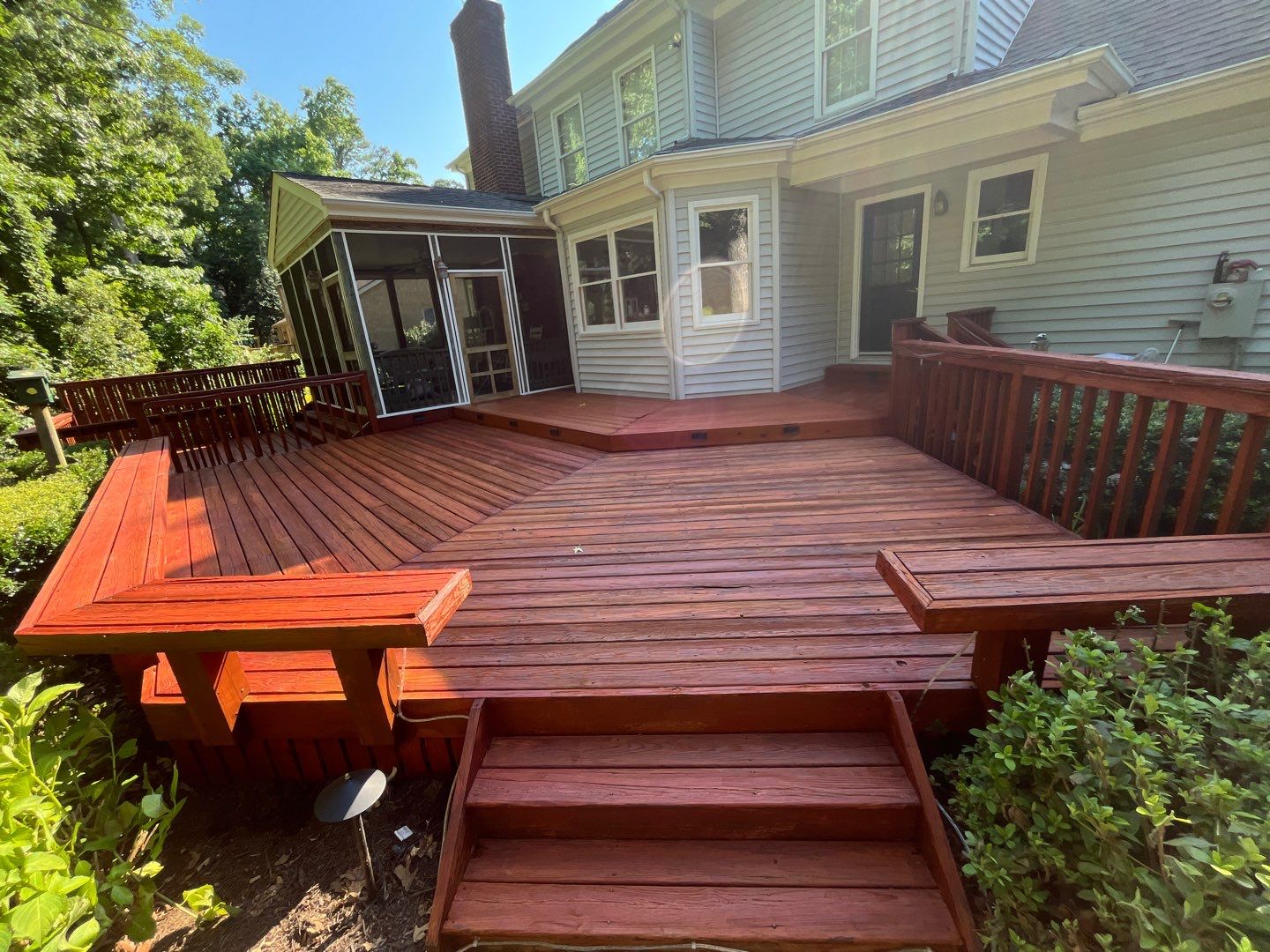 Triple deck re-staining by AKK Painting LLC