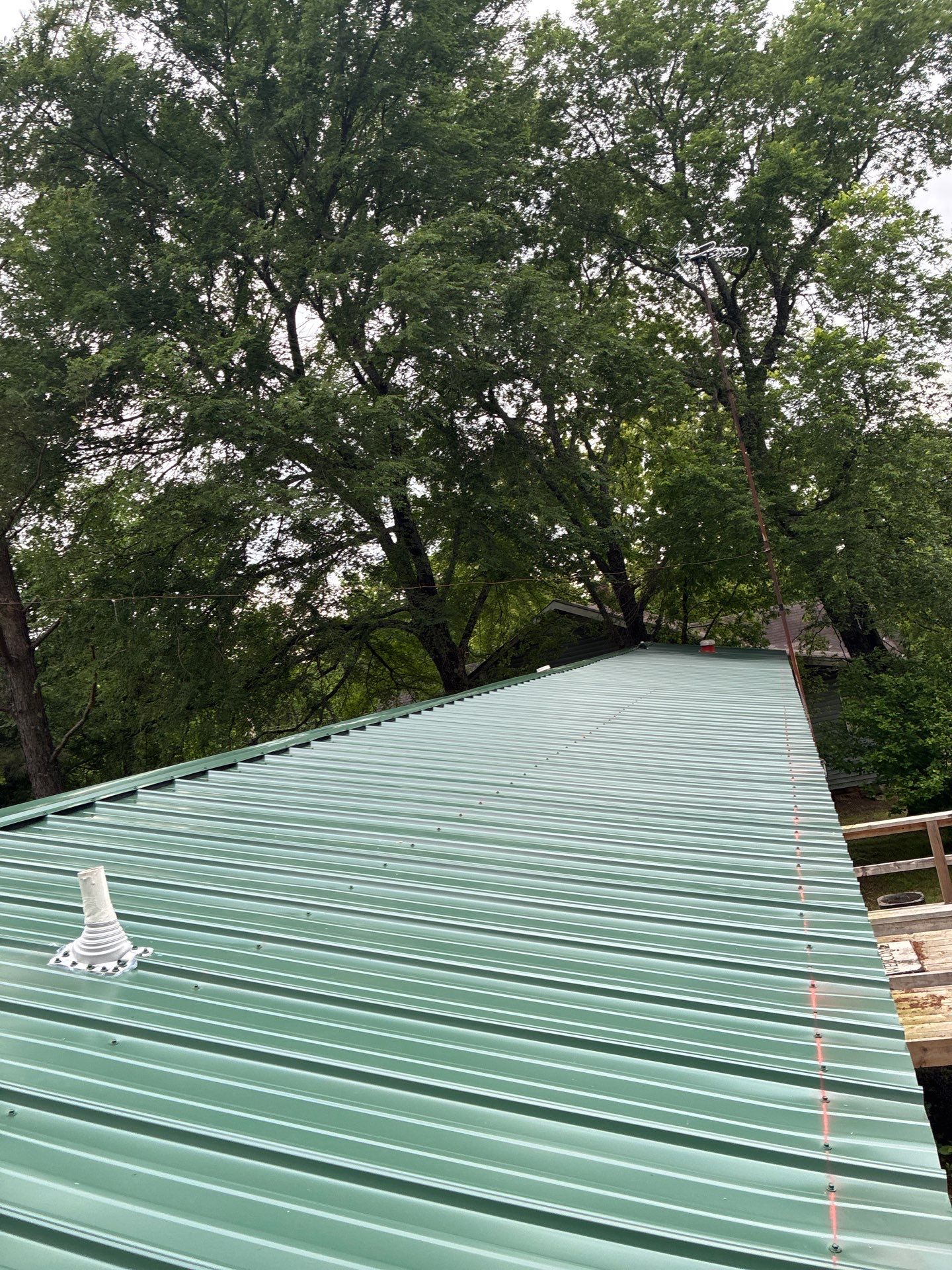 Metal roof installation by In & Out Construction & Remodeling, LLC