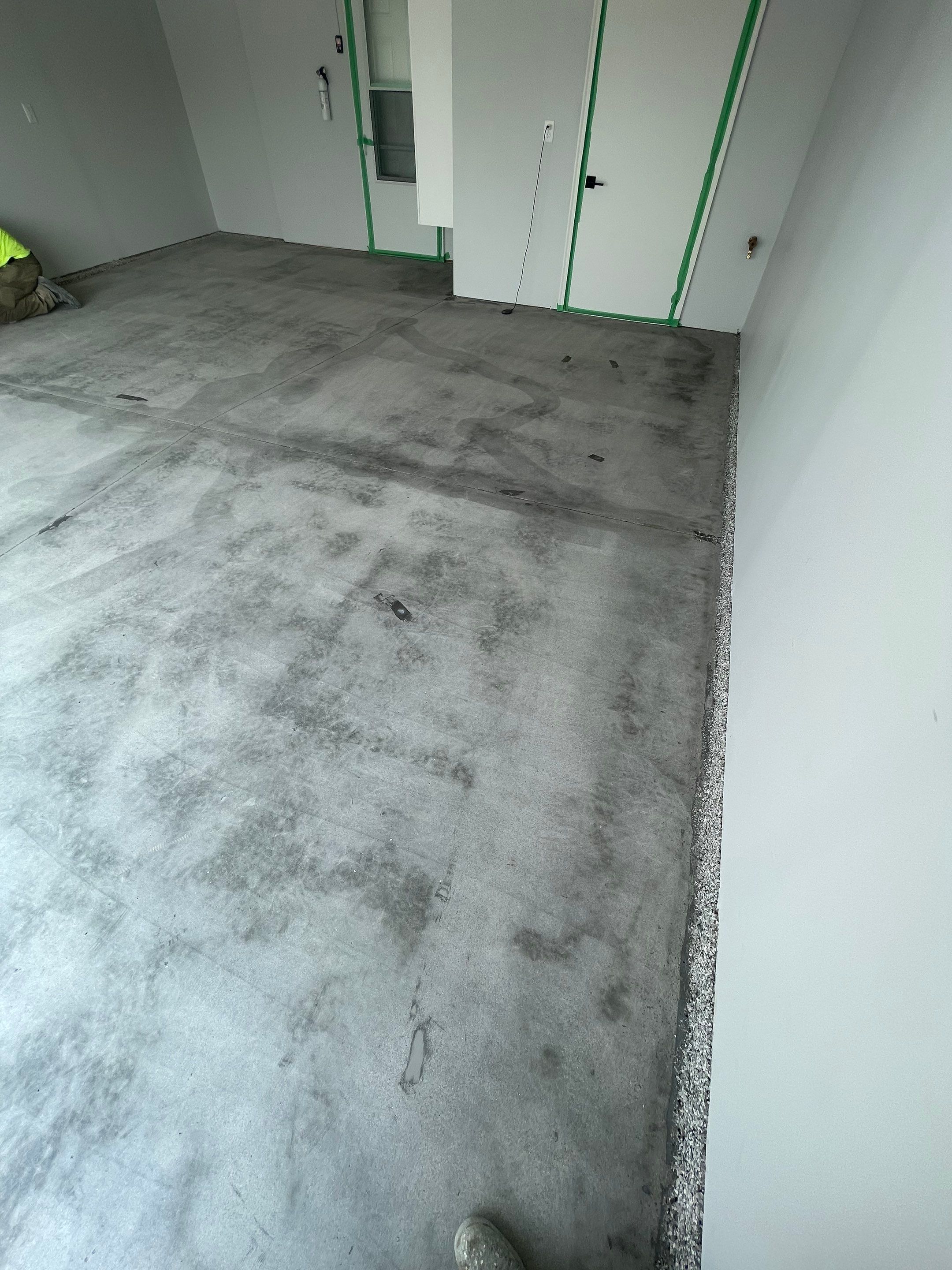Custom Coyote Flake Garage Floor Coating in Sioux Falls by Select Painting, Coatings & Garage Cabinets
