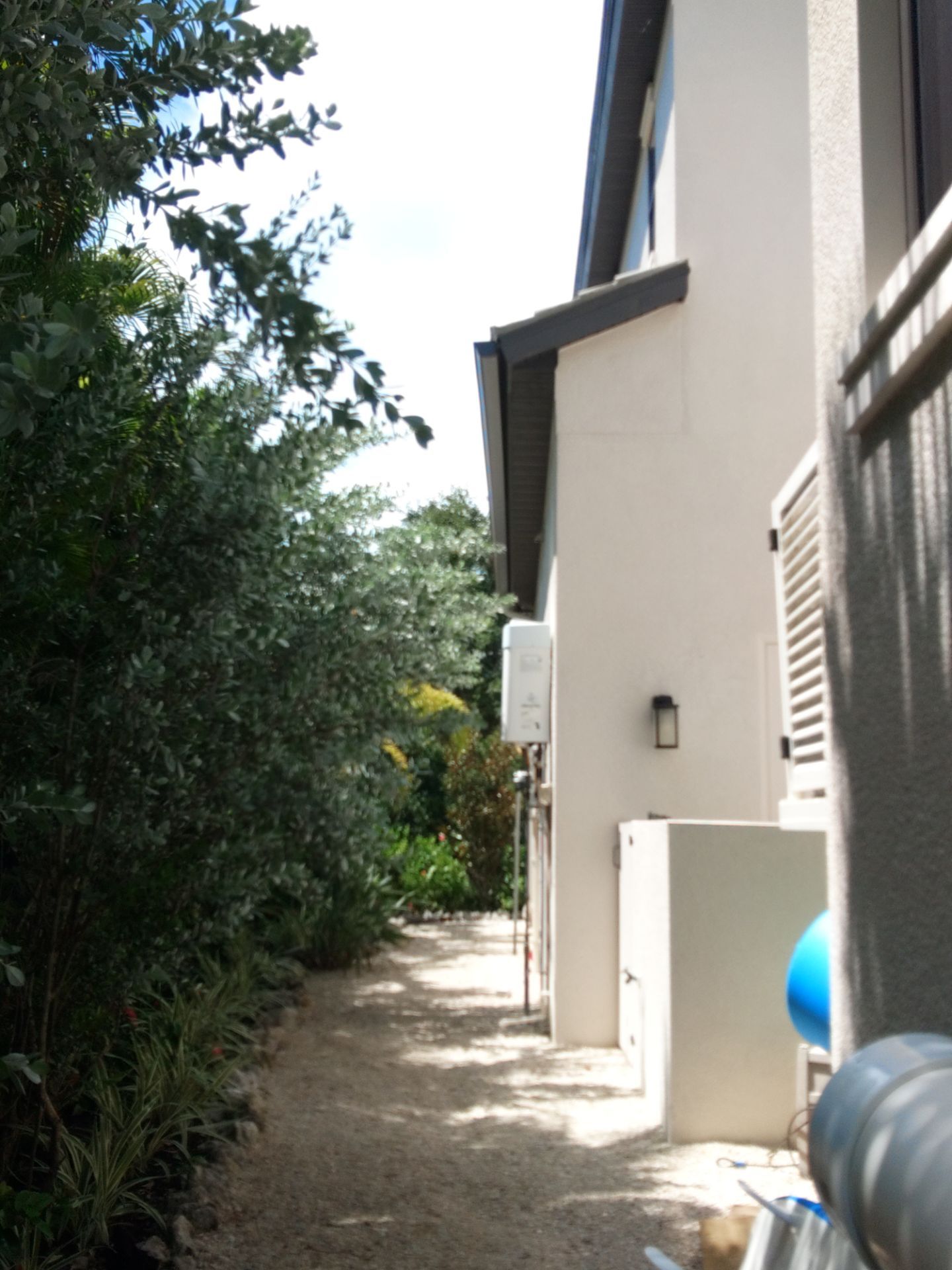 Bronze Gutters and Almond Downspouts in Longboat Key FL by Gutter Professors