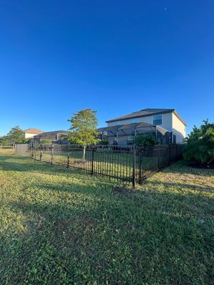 Aluminum Fence Installation using Black 3 Rail Aluminum Fence
