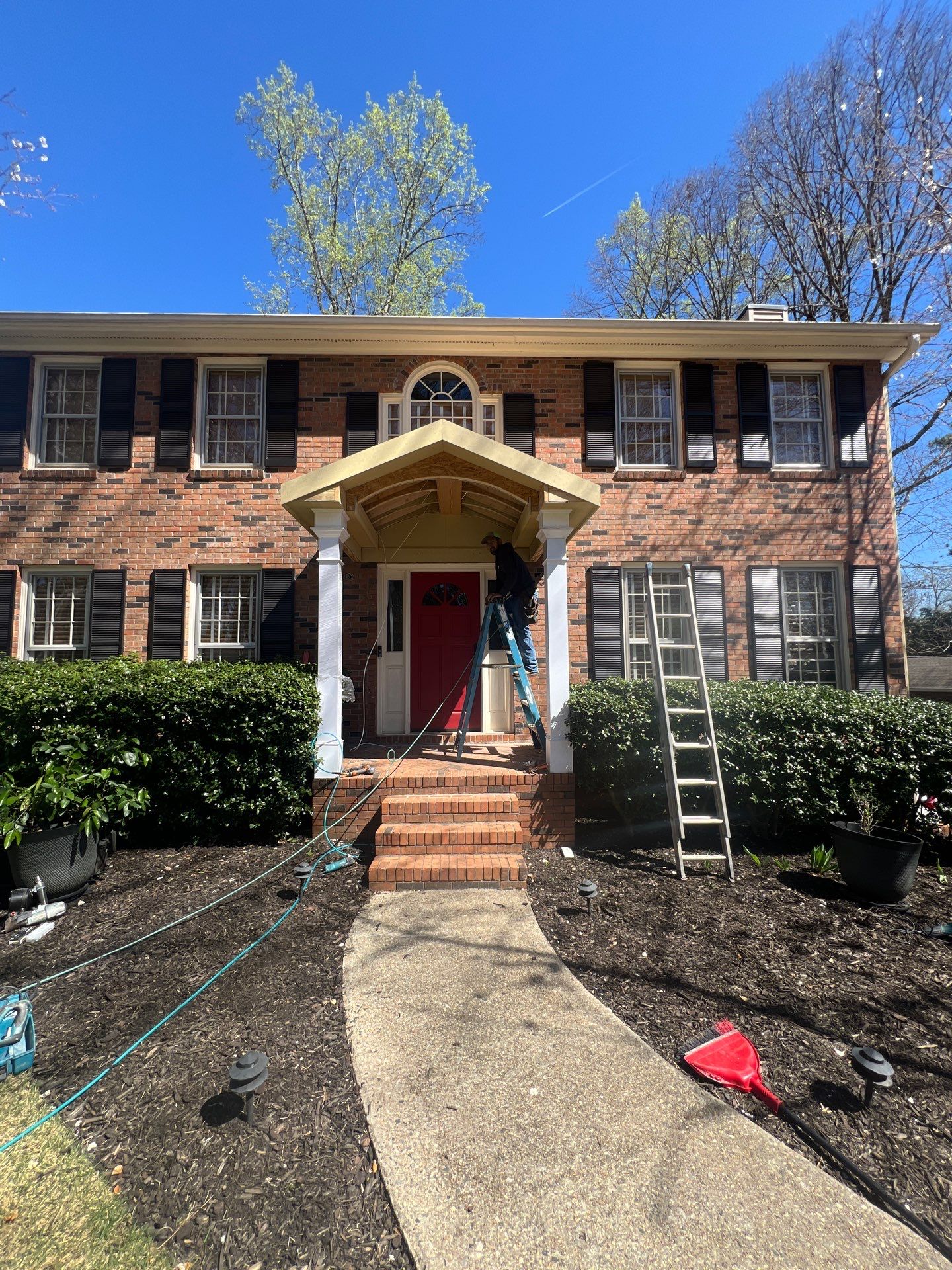 Exterior Entryway and Trim Renovation for Smyrna Brick Colonial by Swift Home Renovations