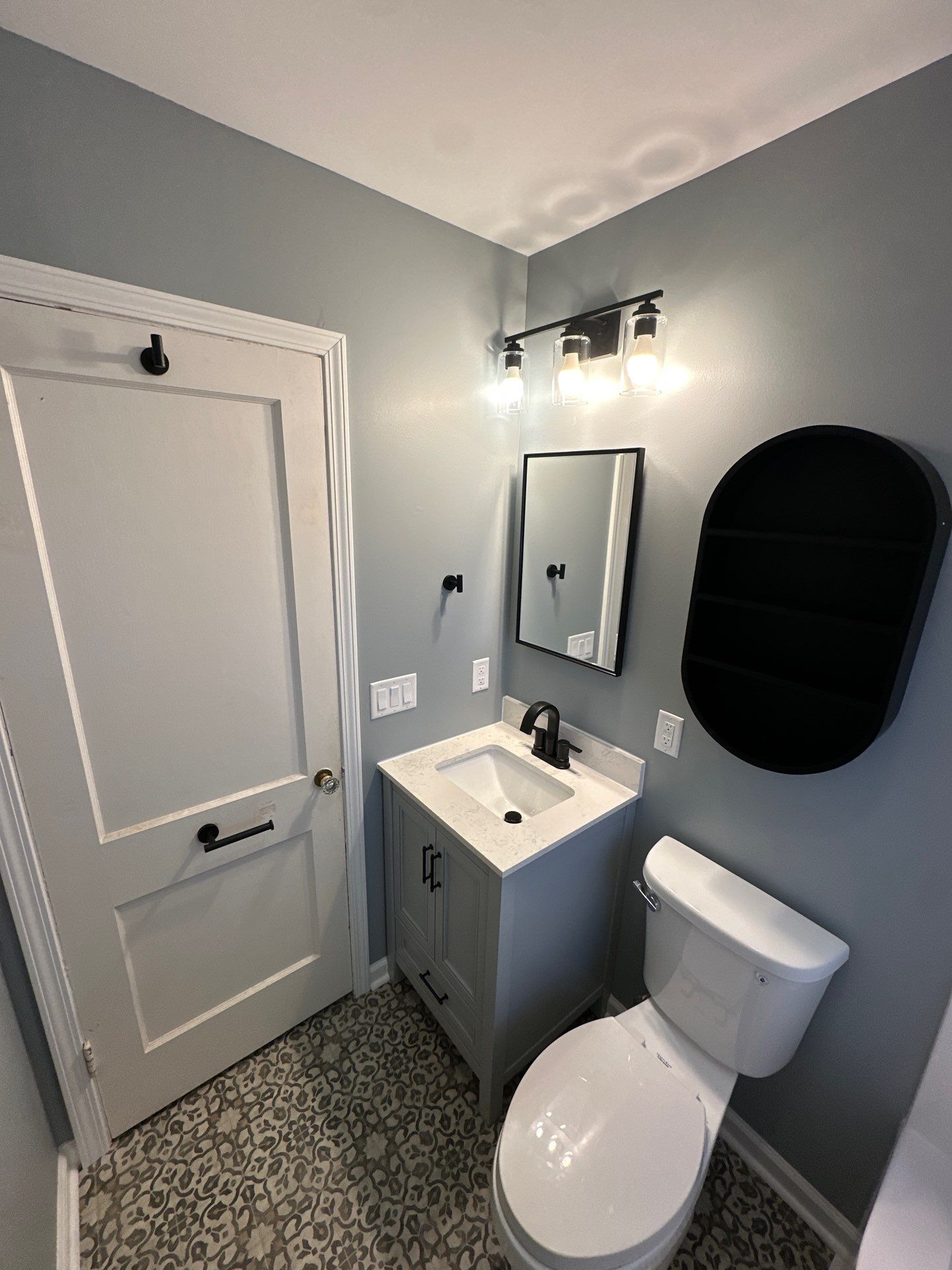 Sleek Bathroom Refresh by ProCore Contractors