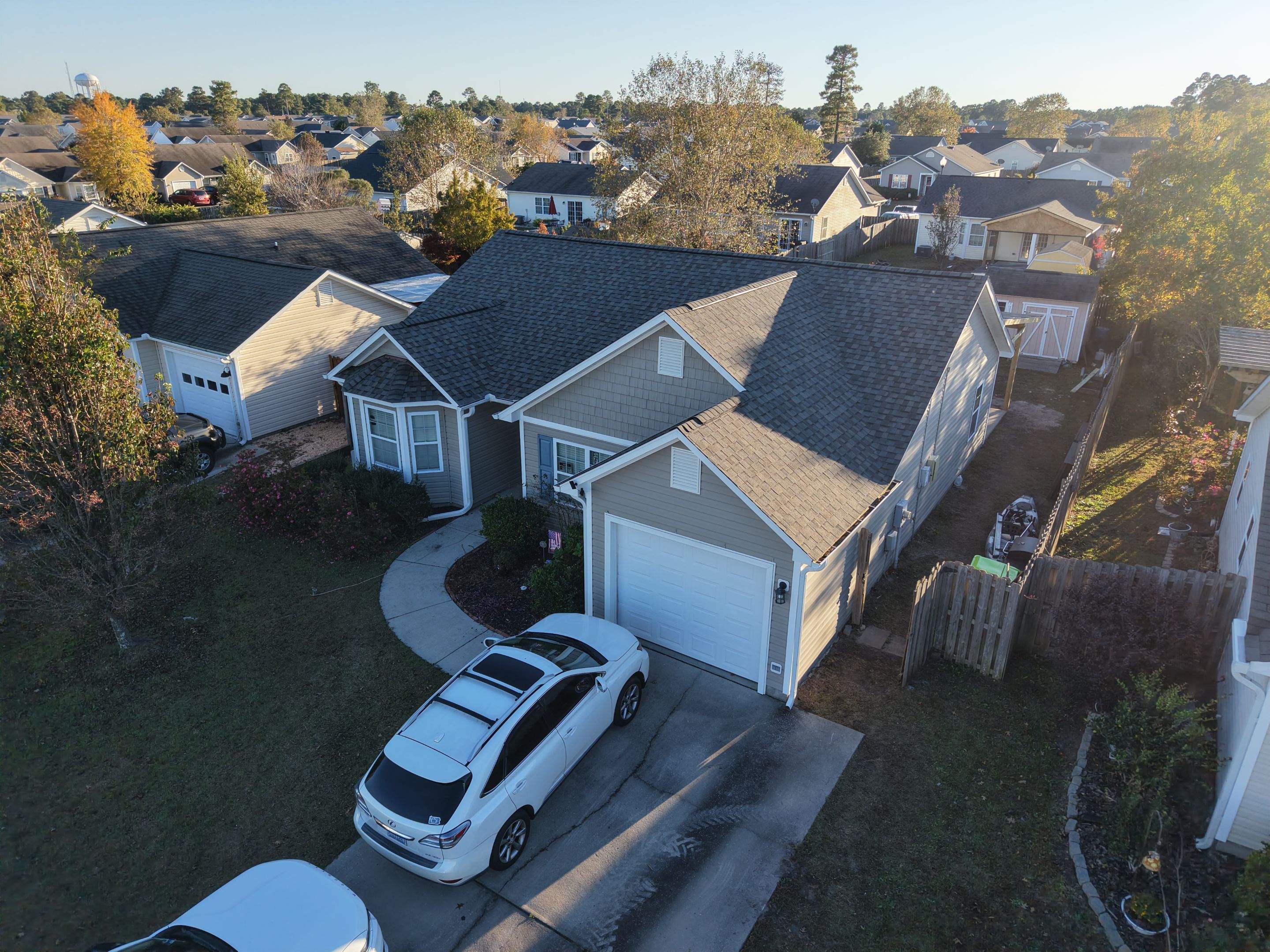 Covered Porch Build and Fortified Roof Replacement with Solar Panels by RGR Construction and Roofing, LLC