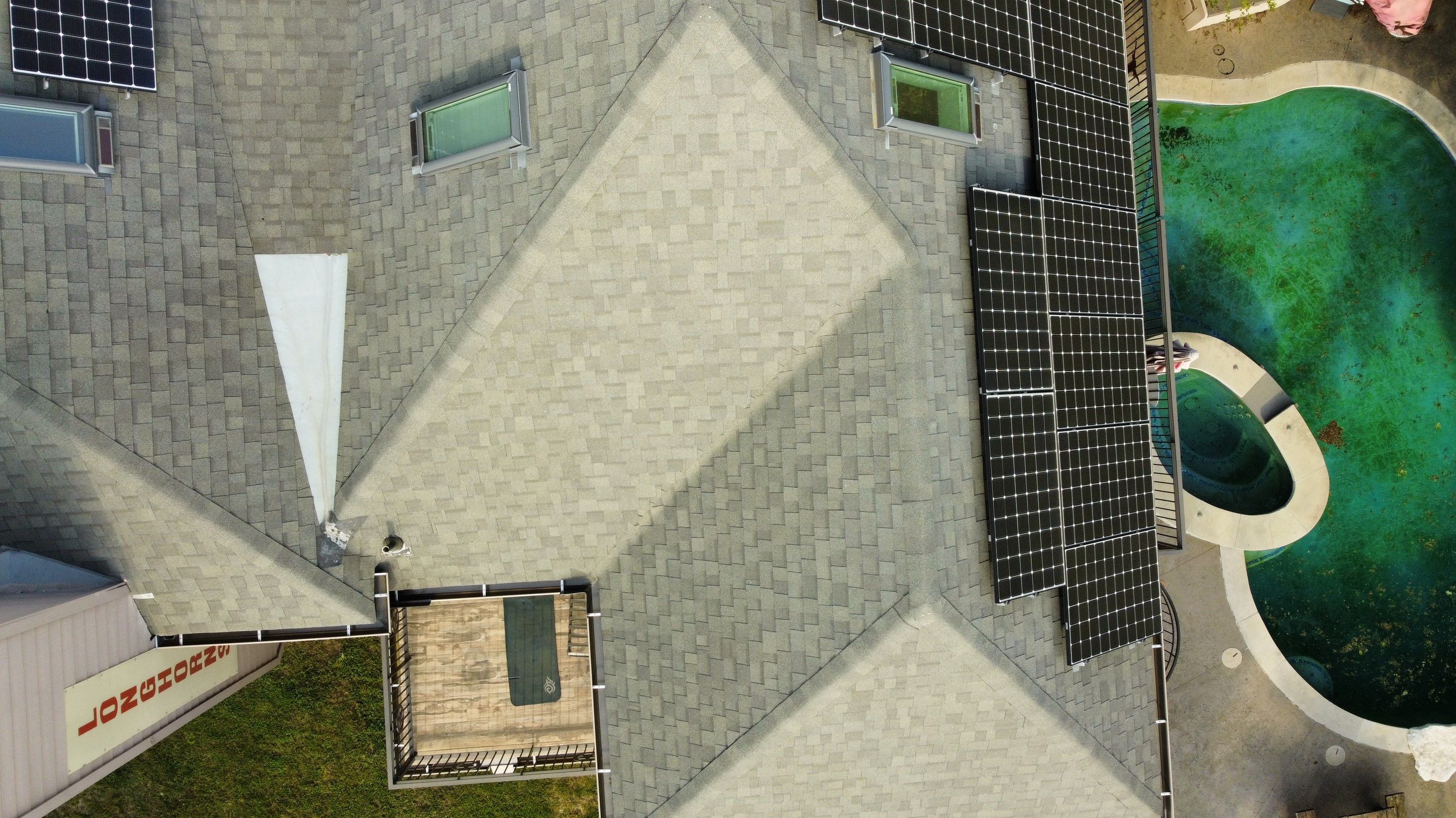 Residential Roof Replacement and Solar Panel Integration in Austin by Caliber Restoration LLC