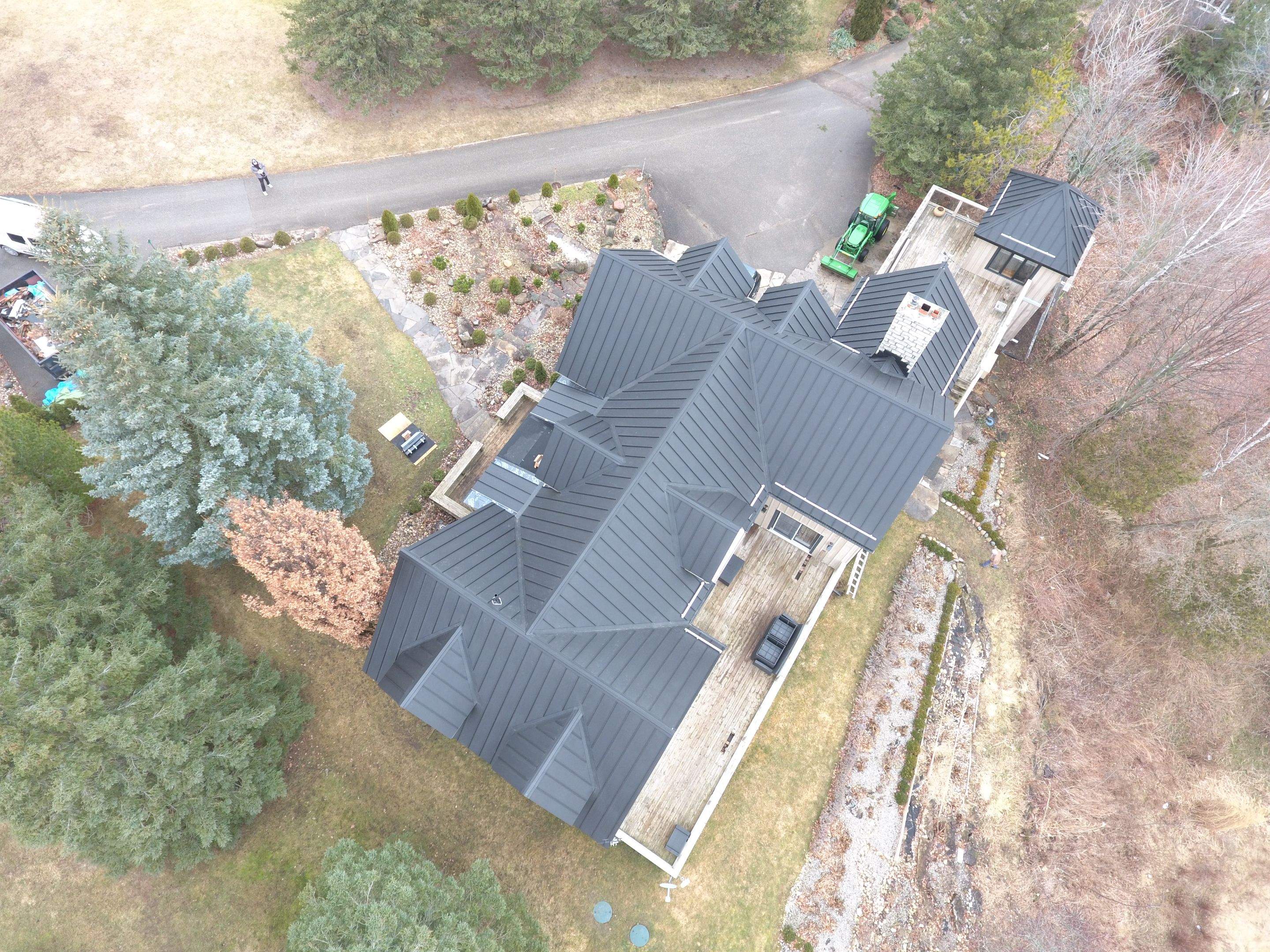 Residential Roofing Installation using 24 Ga Standing Seam Metal by Jay Carter Roofing & Sheet Metal