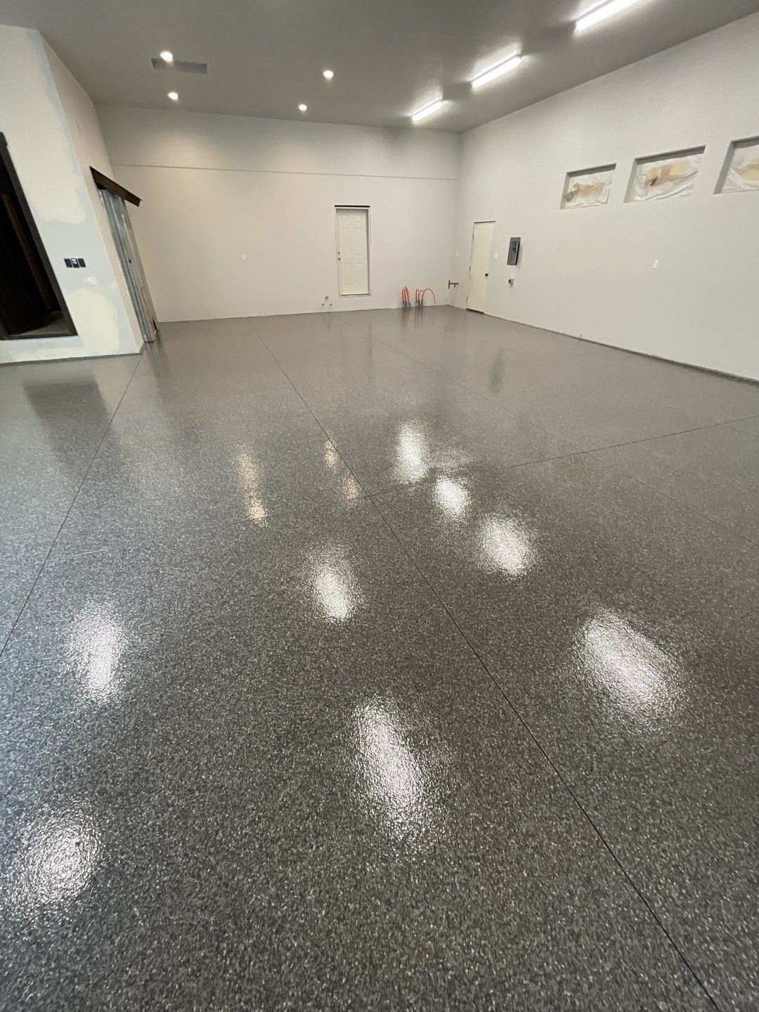 Garage Transformation using Silver Creek and the Penntek Evolution Flooring System by Croc Coatings, LLC