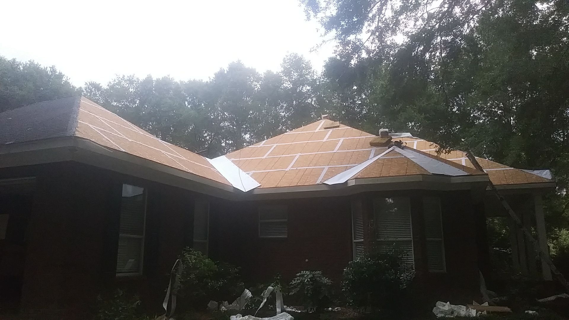 Residential Roofing Installation using Metal roofing by American Roofing & Construction LLC