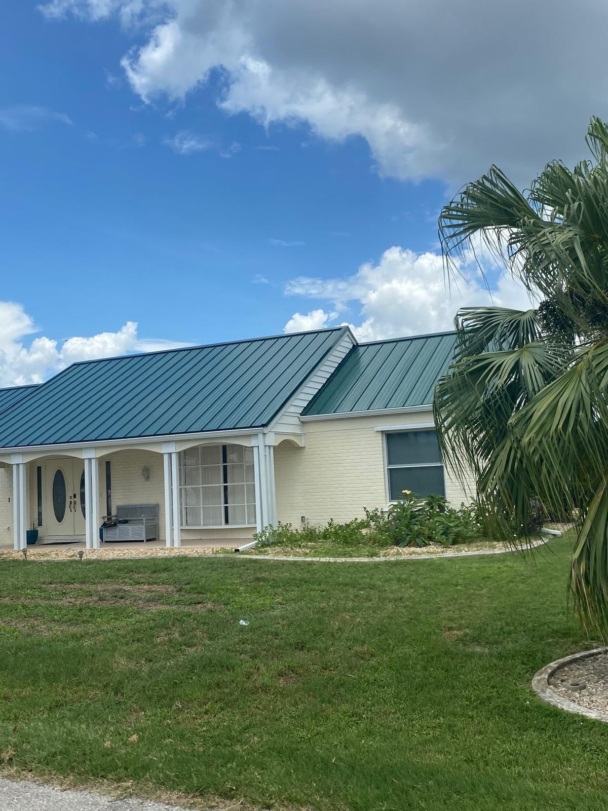 Residential Roofing Installation using Gulf Coast Metals Gulf Seam Panels by Four Peaks Roofing