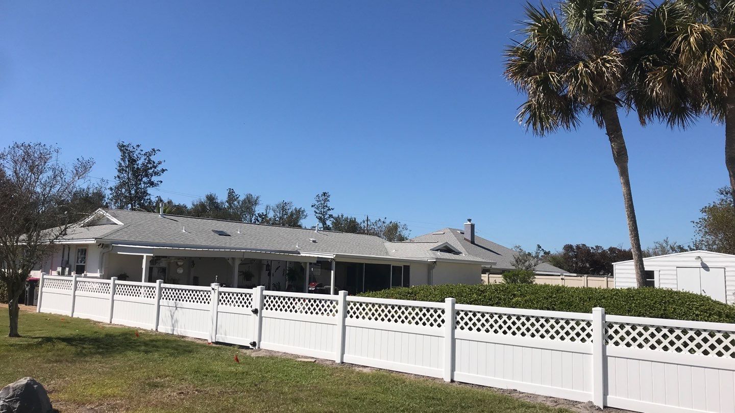 Fence Installation using White Vinyl by Hip Square Fence Inc.