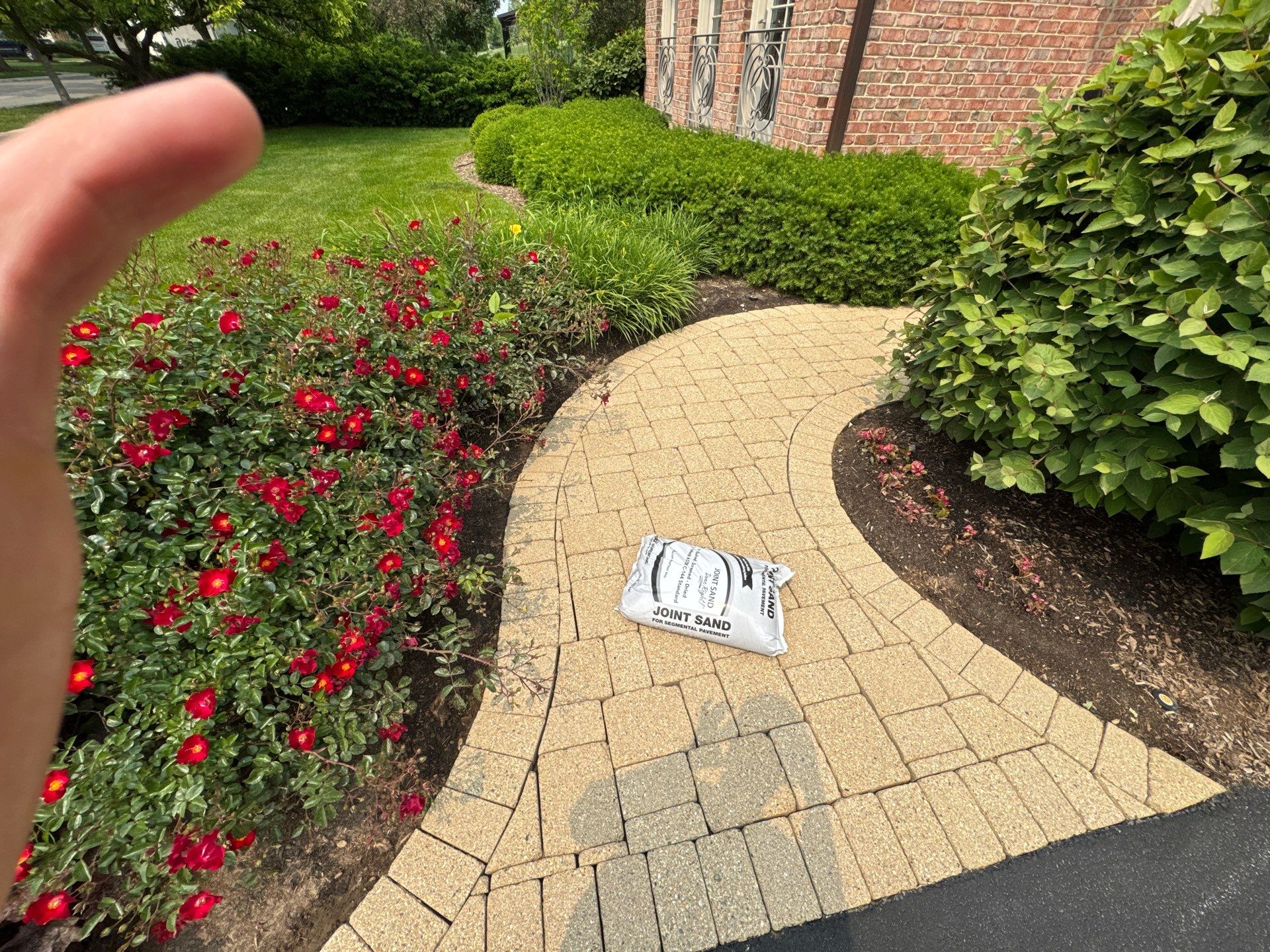 Brick paver repair, cleaning sanding and sealing by Northern Power Washing LLC.