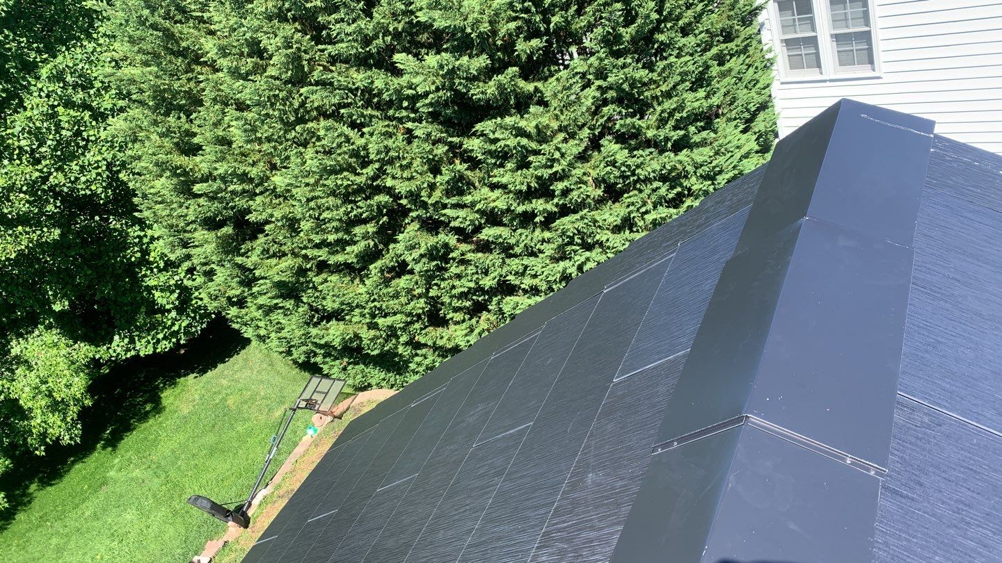 Tesla Solar Roof Replacement using Tesla Solar Roof V3 tiles by American Home Contractors