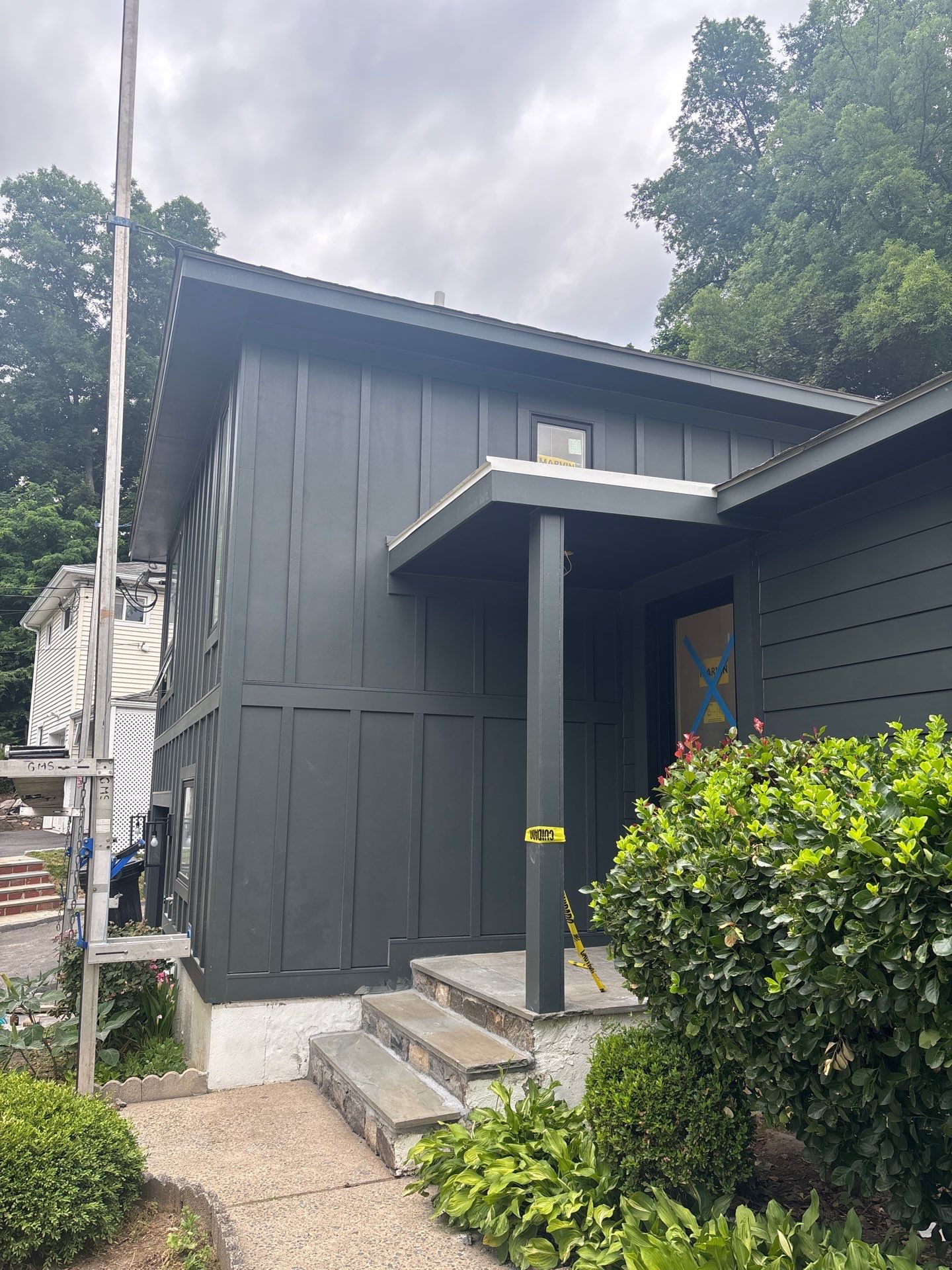 James Hardie Charcoal Board & Batten in Greenwich, CT by Ideal Siding - Westchester