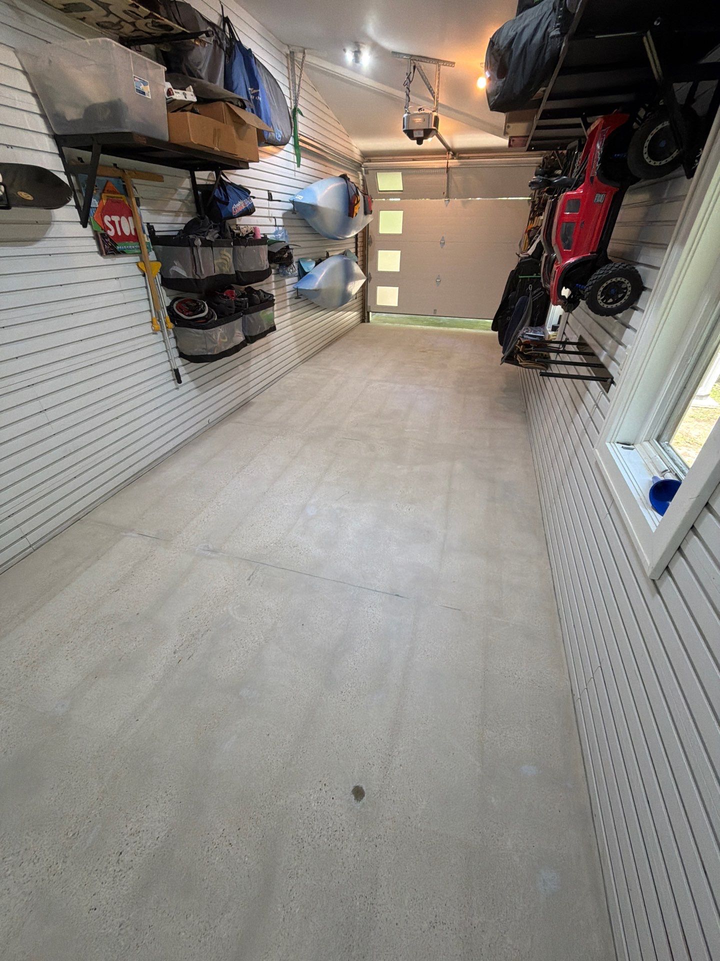 Residential Garage Epoxy Flake Floor Installation in Grand Haven by Gordon Painting