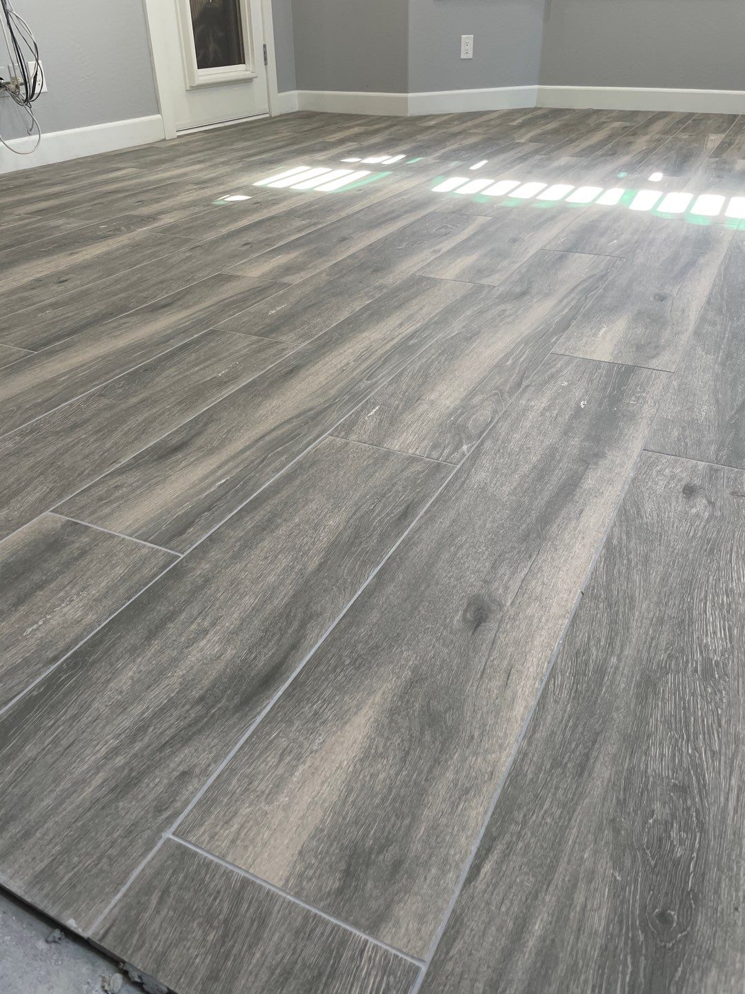 Home Remodel Using Multiple Materials  by Footprints Floors of Chandler 