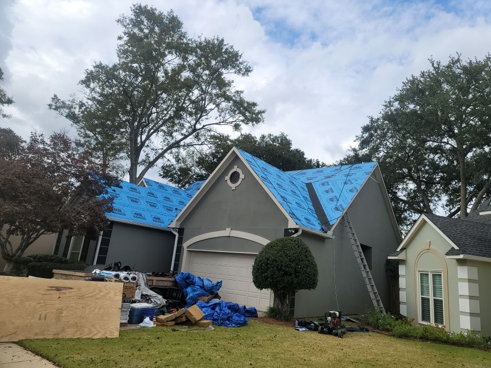Residential Roofing Installation using Roof Replacement by American Roofing & Construction LLC