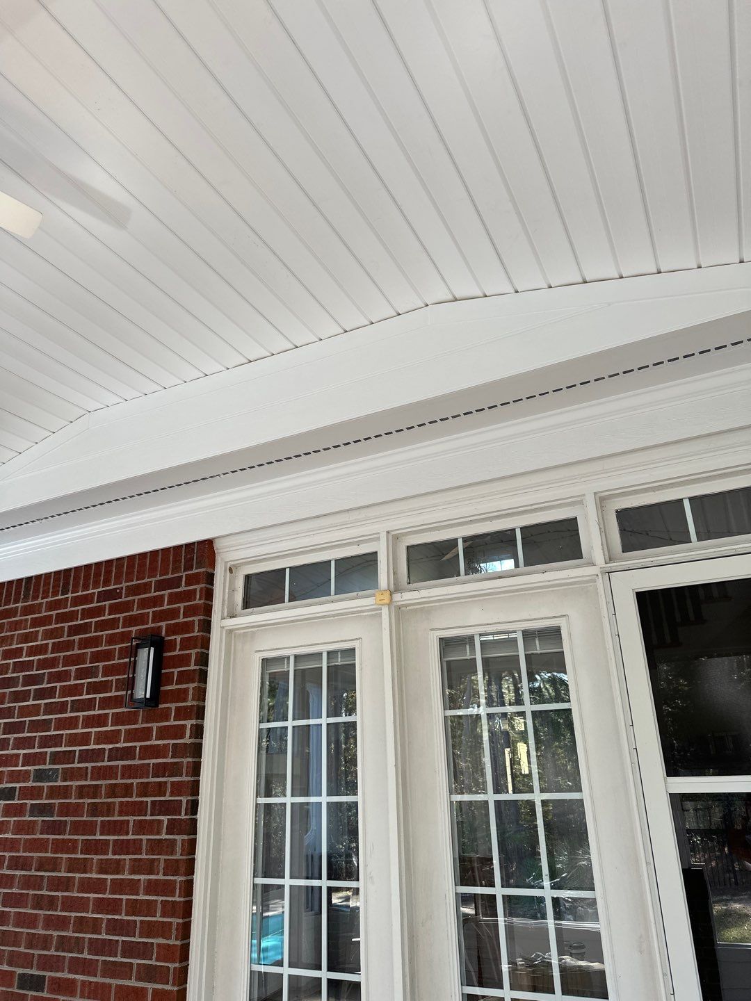 Custom Screened-In Porch Addition with Open Gable Roof in Fayetteville by The Remodeling Company