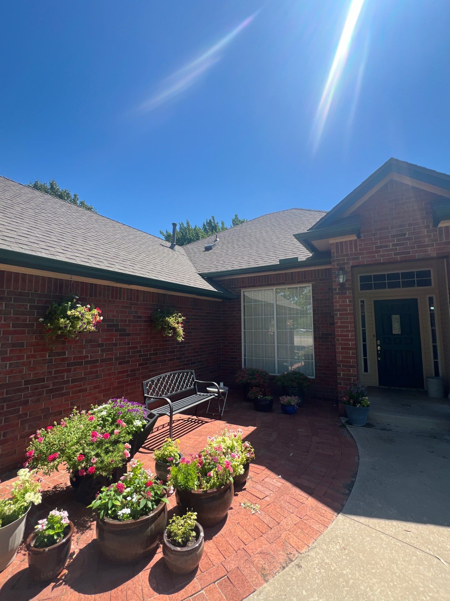 Roof Replacement and Gutter Installation in Edmond, OK by McCann's Roofing and Construction