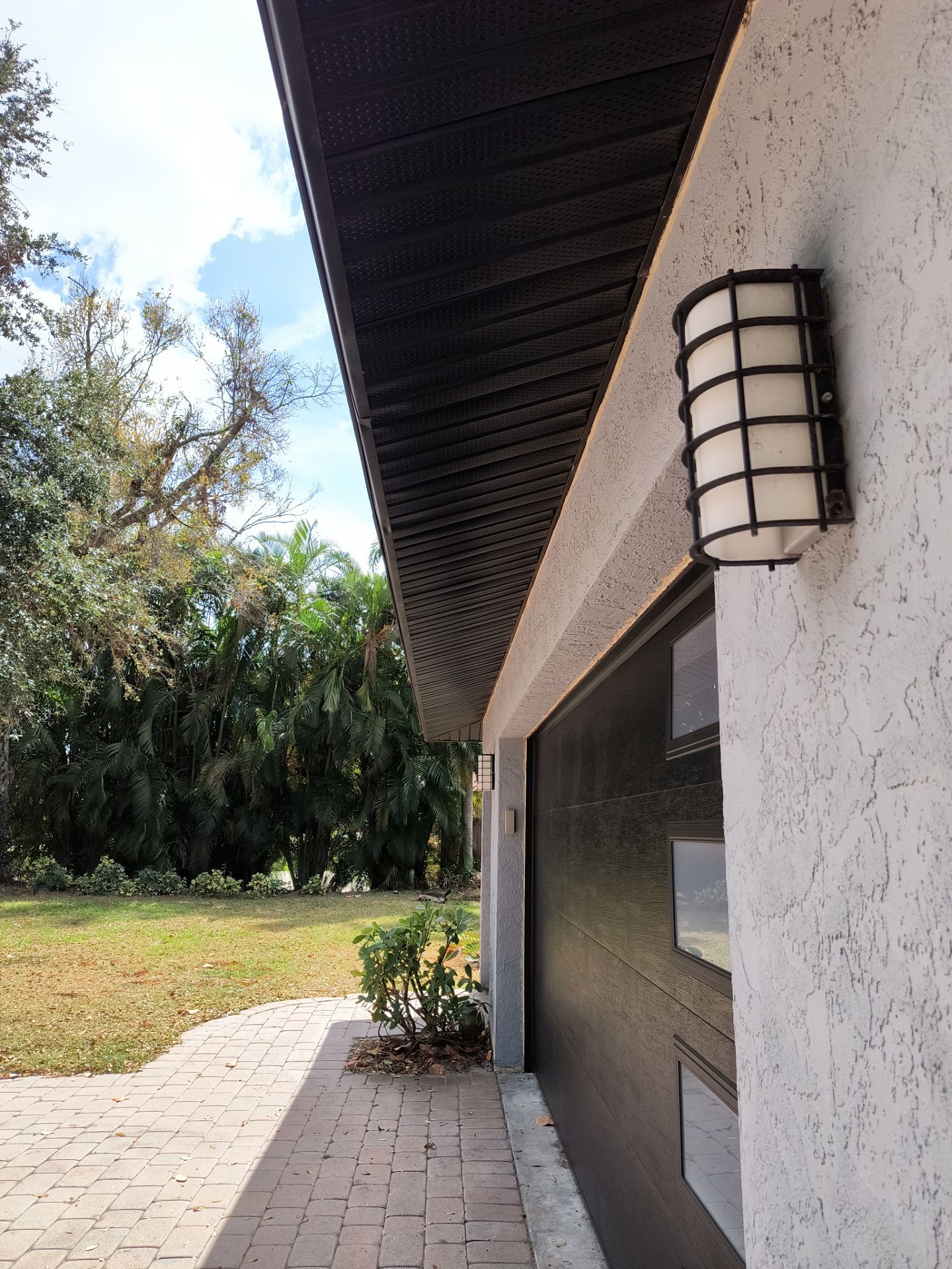 Gutter Repair Service in Sarasota FL - Black Soffit by Gutter Professors