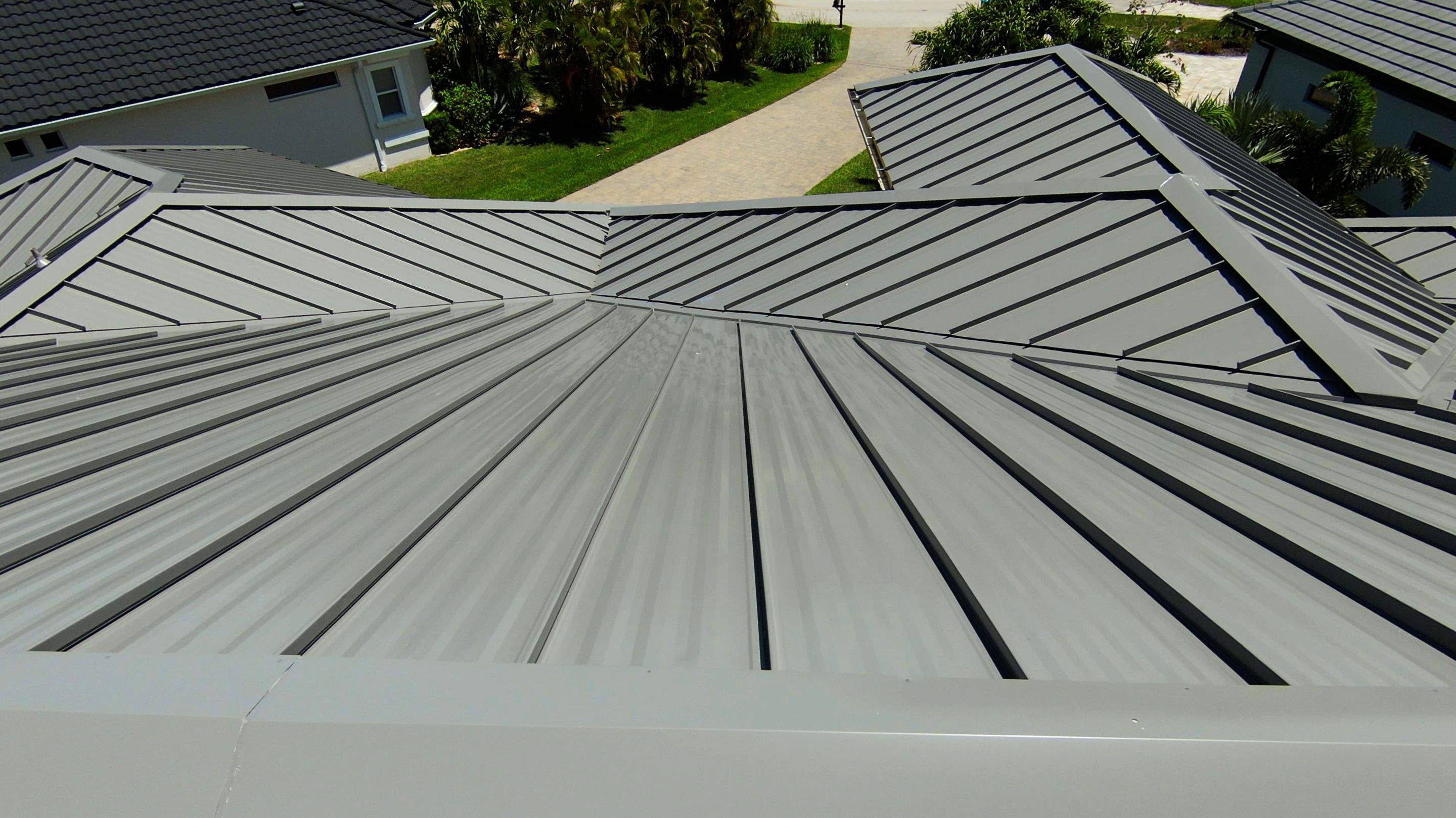 Residential Roofing Installation using Gulf Coast Metals Gulf Seam Panels by Four Peaks Roofing