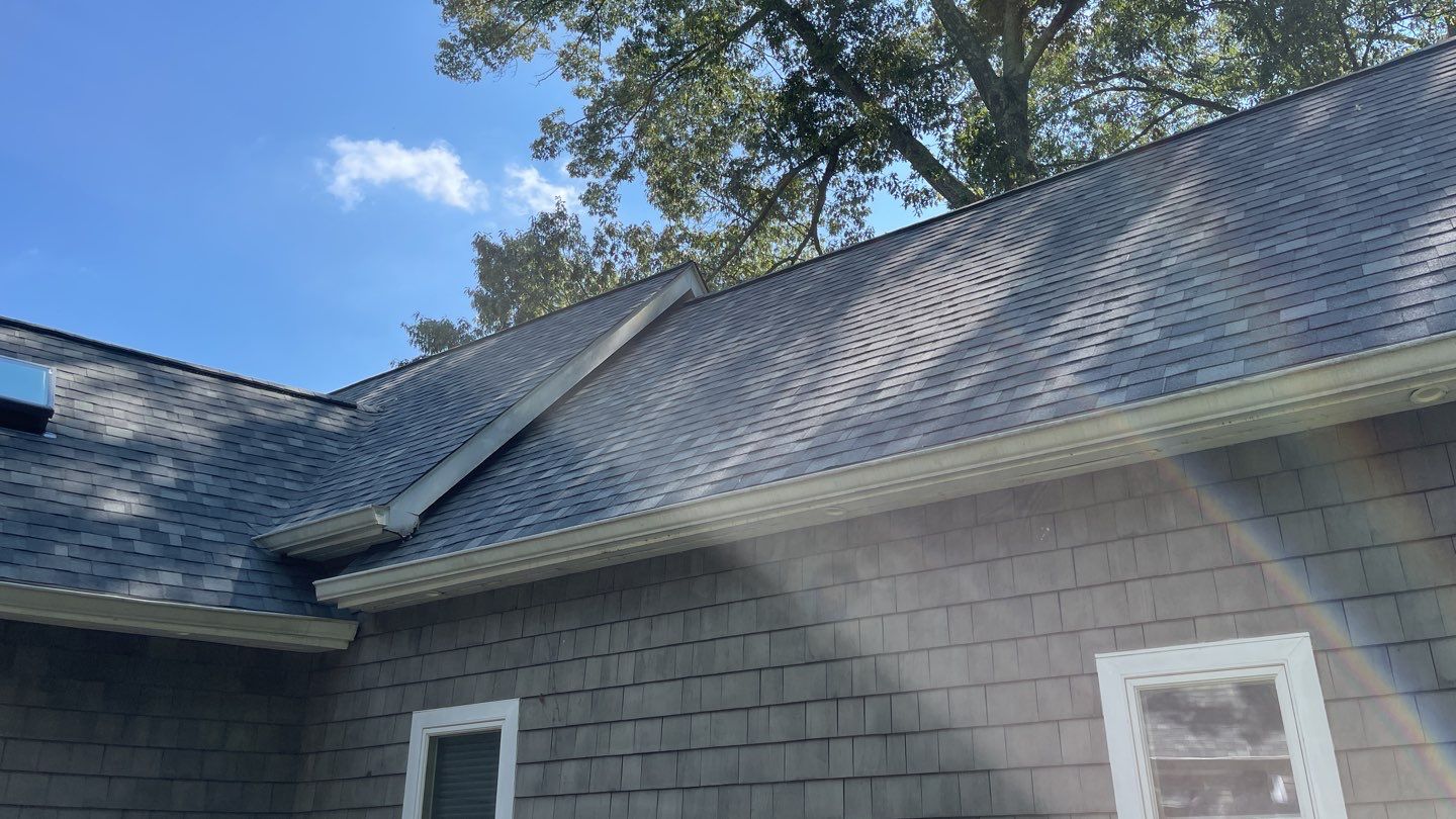 Roof Replacement using IKO Dynasty by American Home Contractors