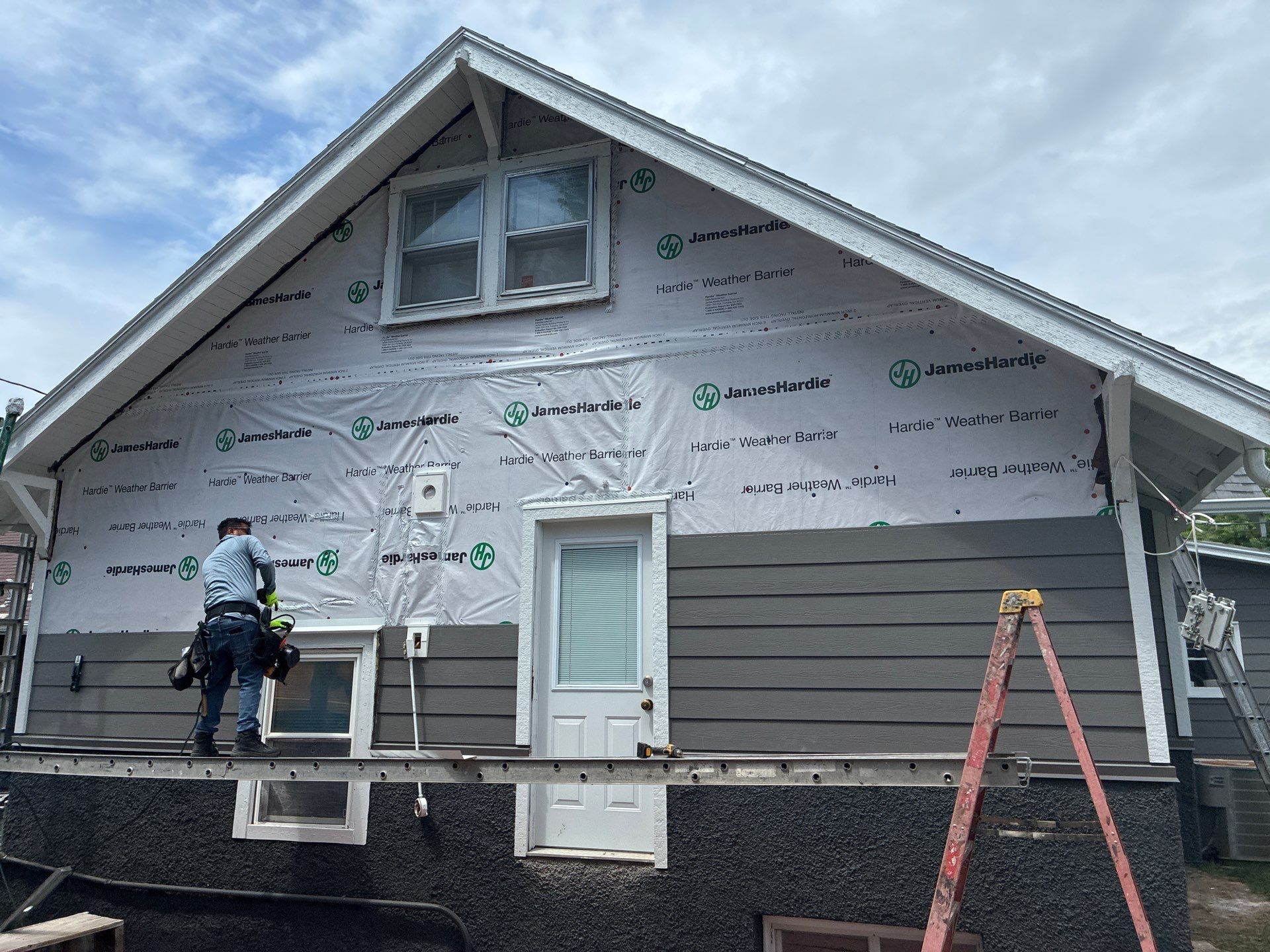 James Hardie Iron Gray Siding Replacement for Omaha Home by Carps Complete Exteriors 