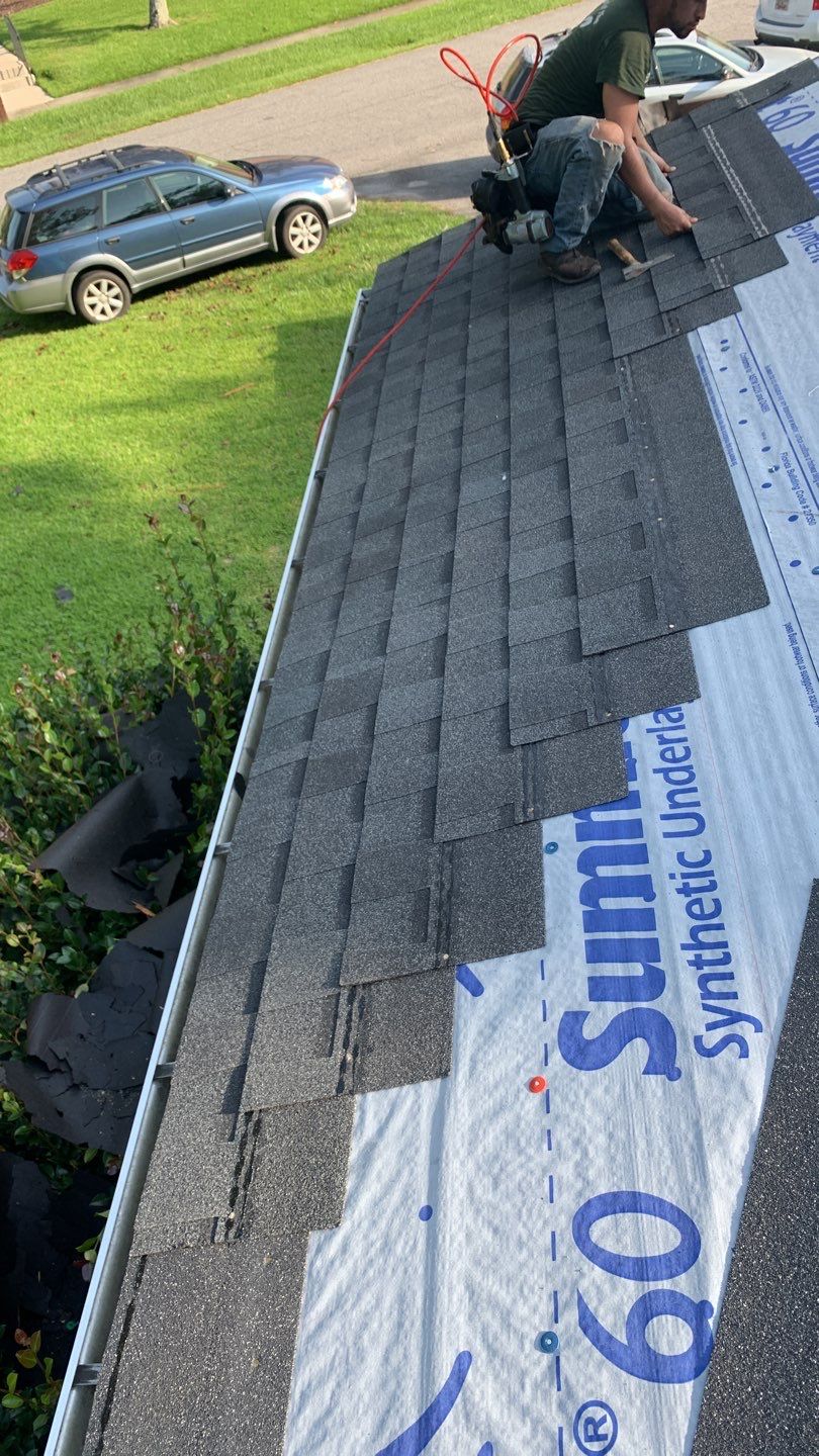 Hail Damage using Atlas Pristine Pinnacle Shingles by Artigues Roofing & Restoration Services