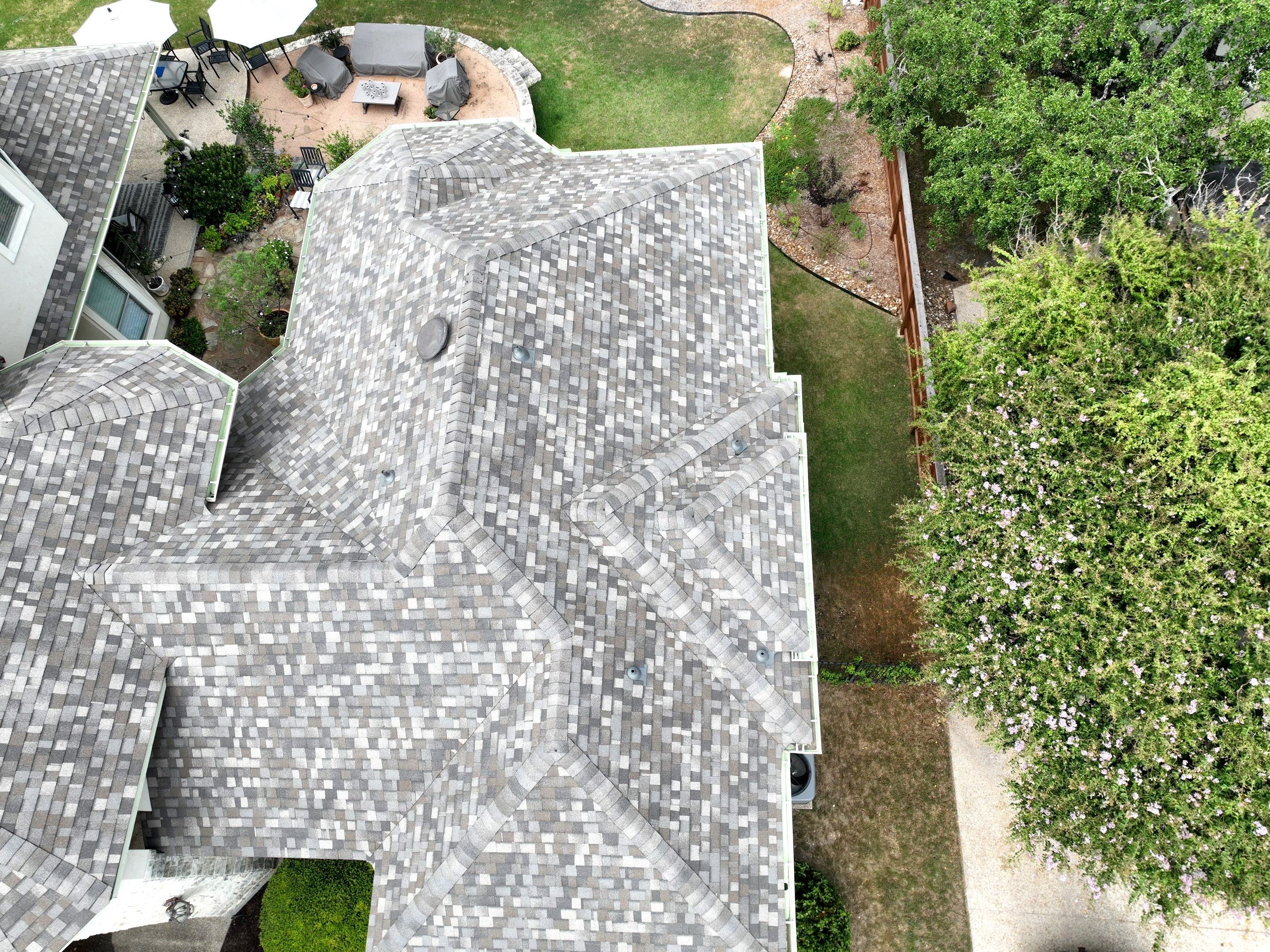 Residential Roof Replacement using 30 Year Laminate Shingles with High Profile Ridge by Premier Roofing and Contracting